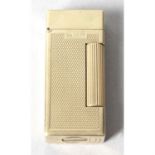 A 9ct gold Dunhill lighter.