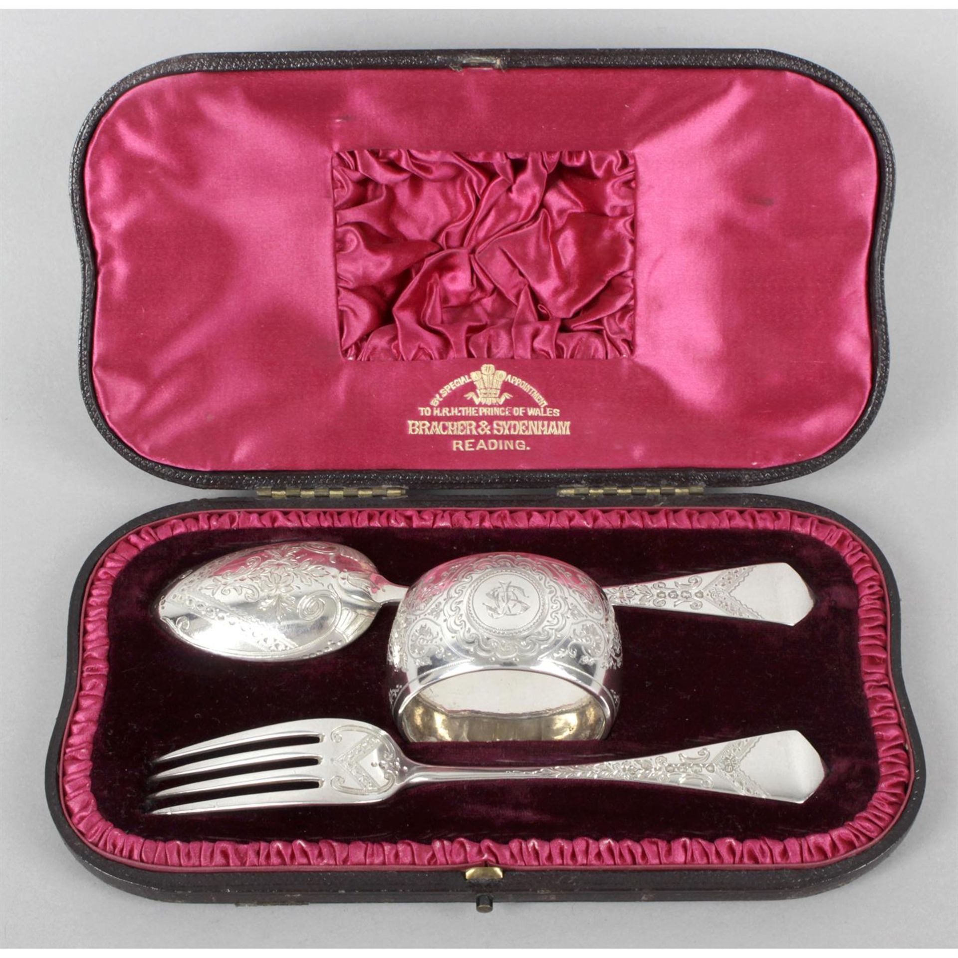 A cased late Victorian silver three piece christening set.