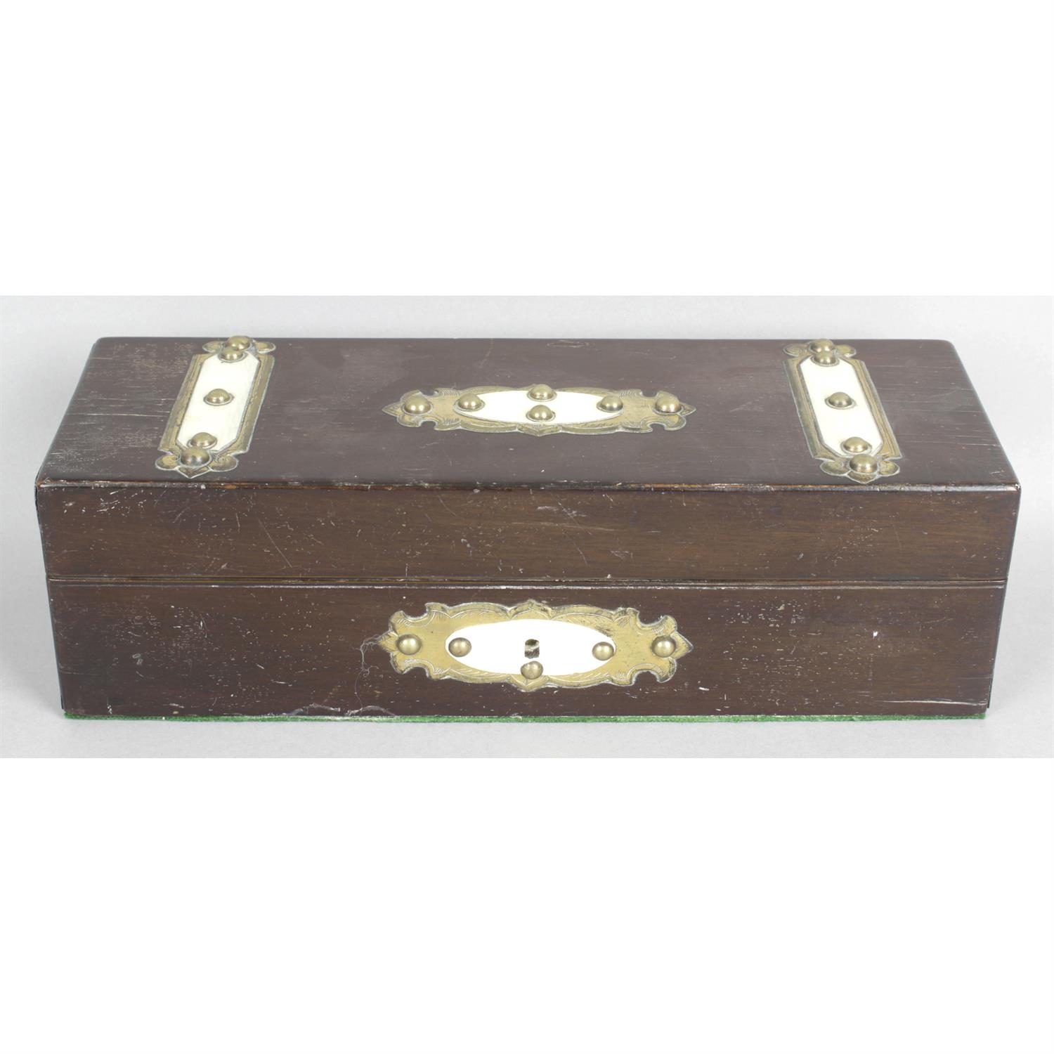 An early 20th century stained wooden glove box.