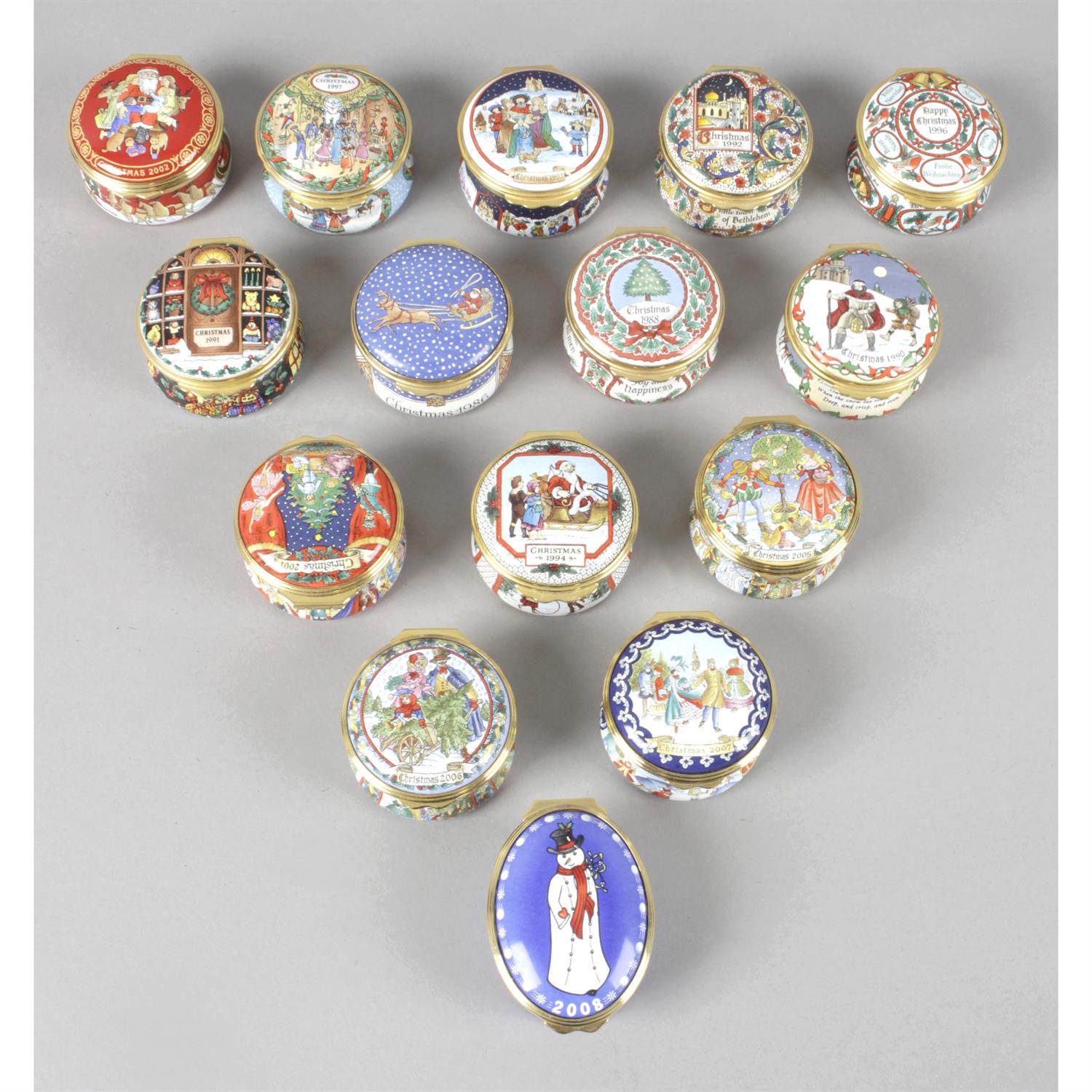 A collection of 26 enamelled trinket boxes