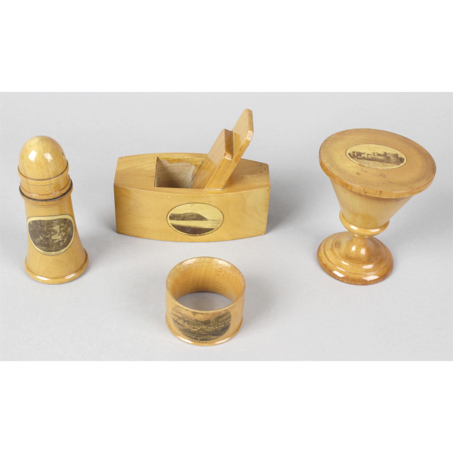 A collection of eight items of Mauchline Ware.