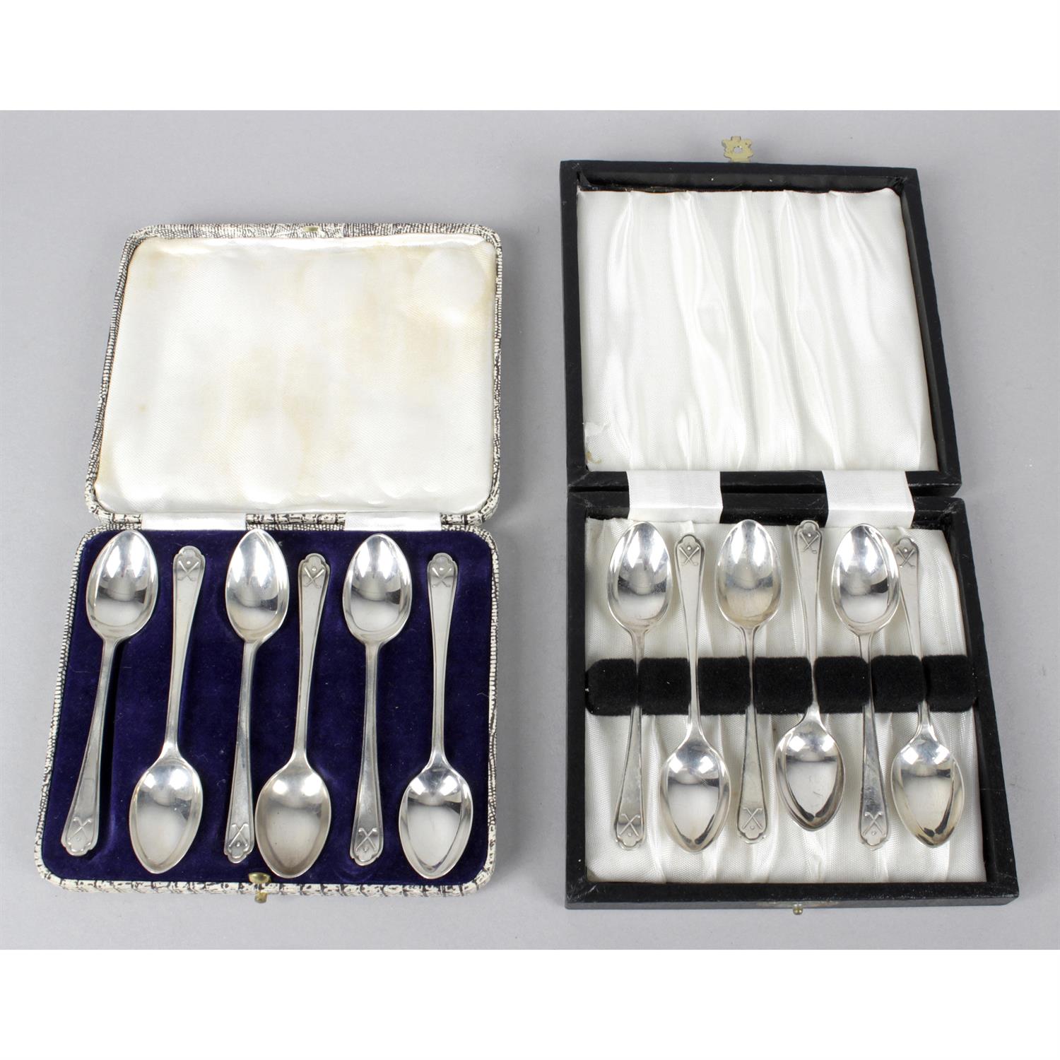 A cased set of six silver teaspoons, and another similar cased set. (2).