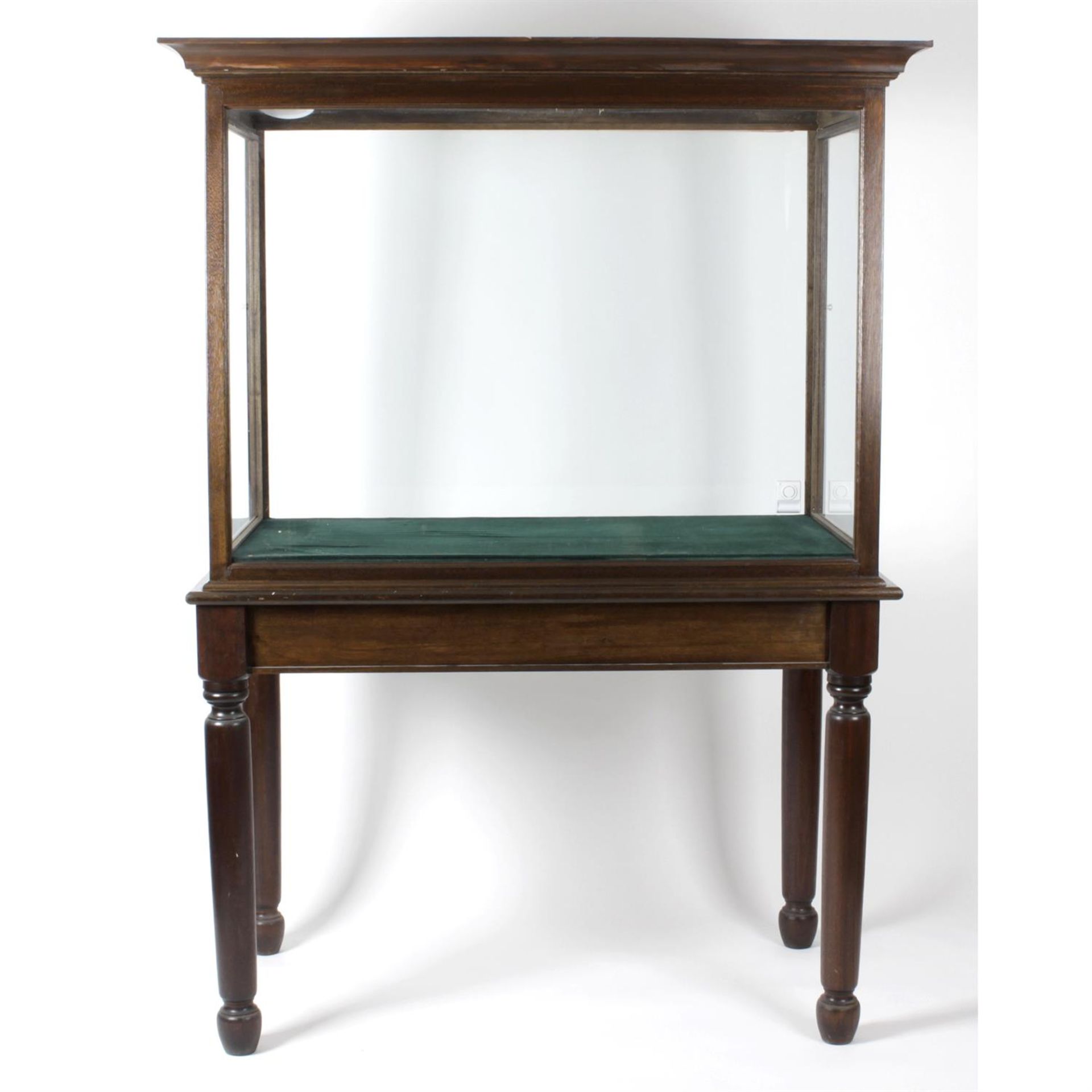 A large reproduction mahogany display cabinet.