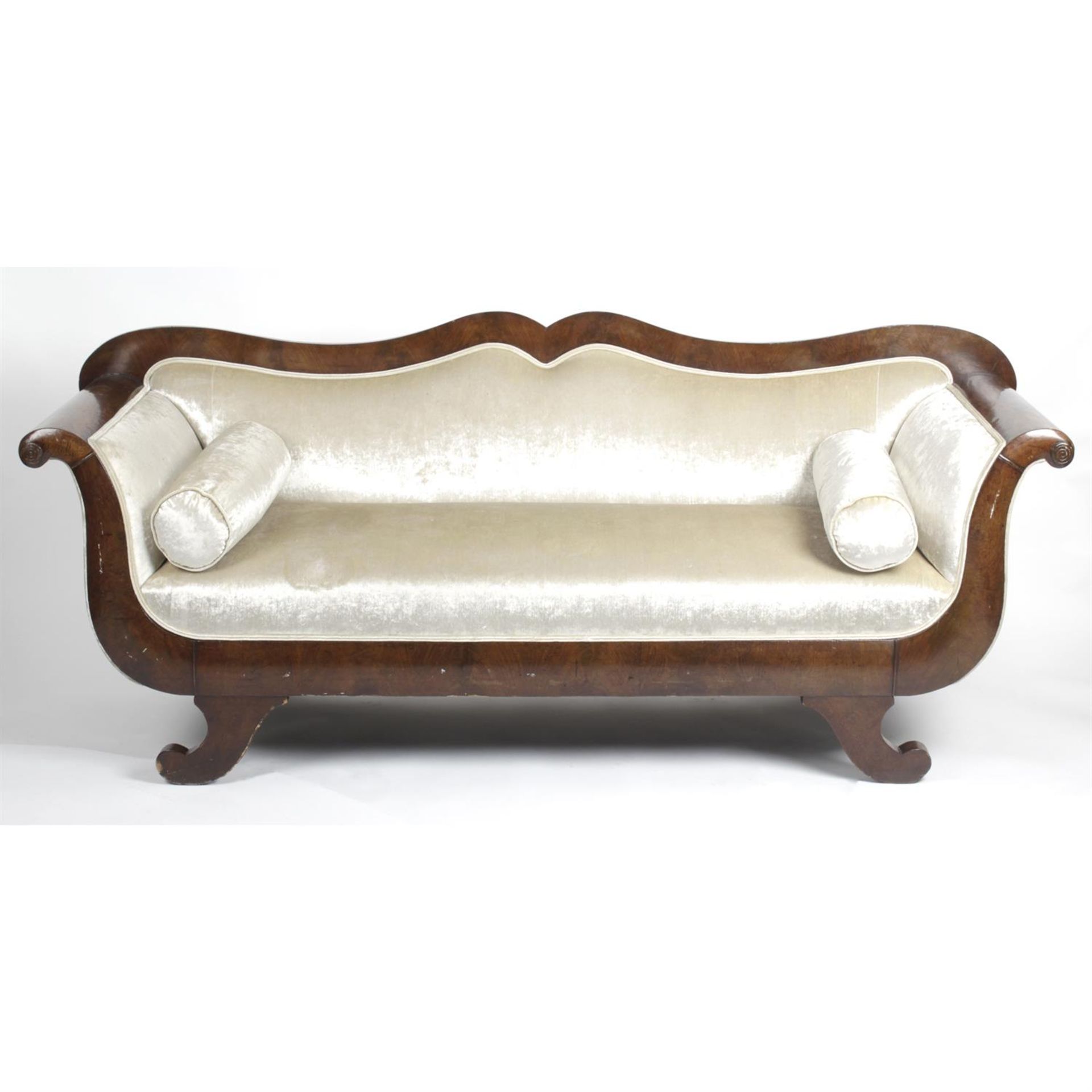 A 19th century Empire-style mahogany framed double scroll arm sofa.