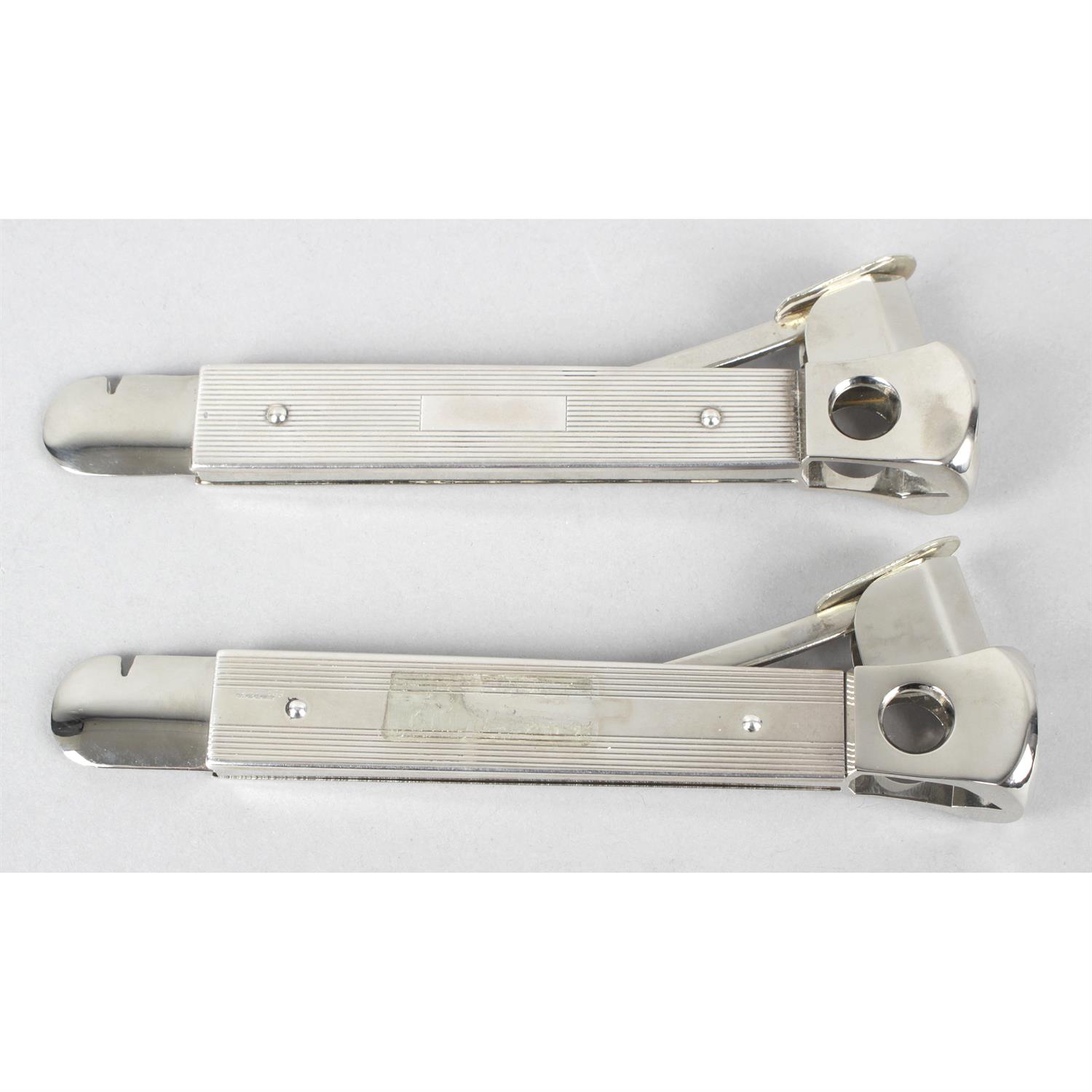 Two silver mounted table cigar cutters.