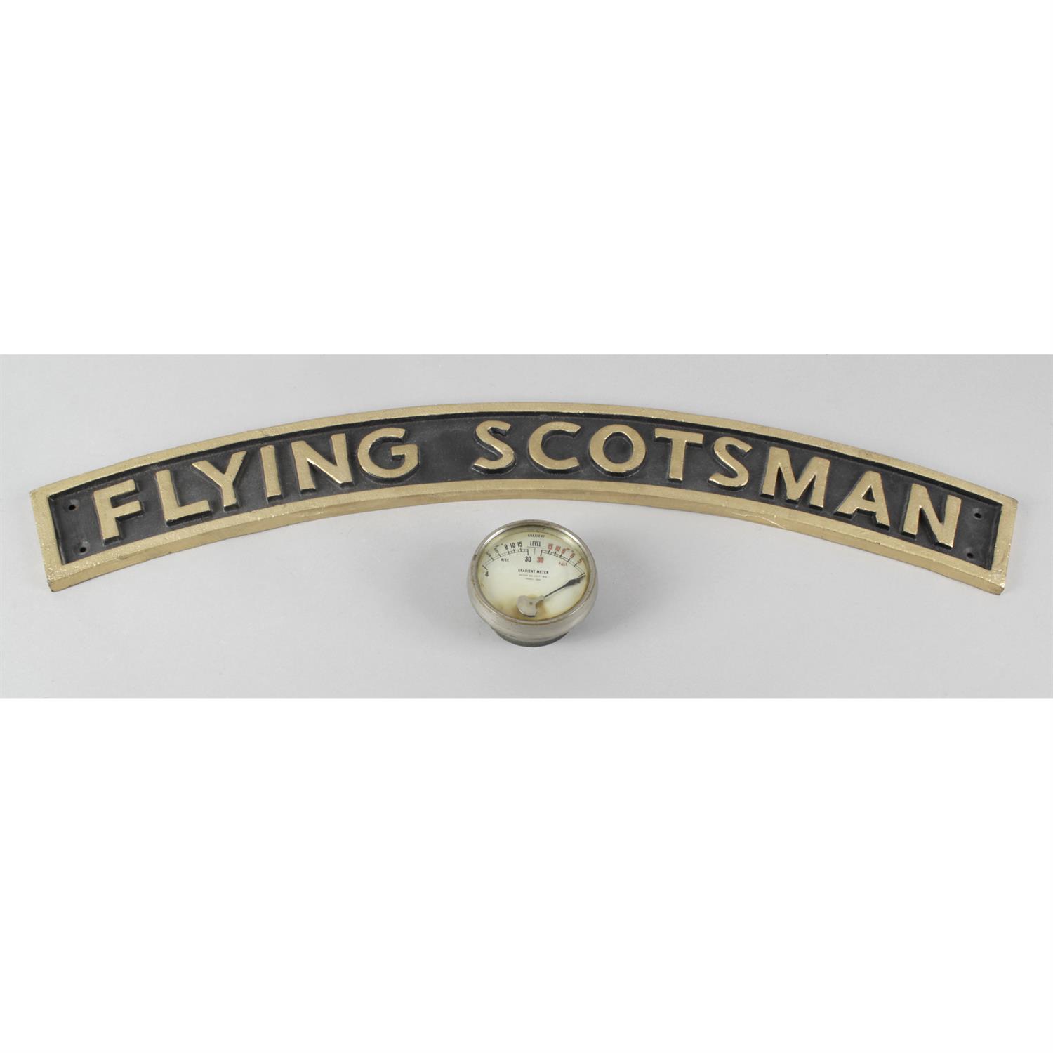 Tapley & Co. vintage gradient meter and reproduction miniature Flying Scotsman name plaque.