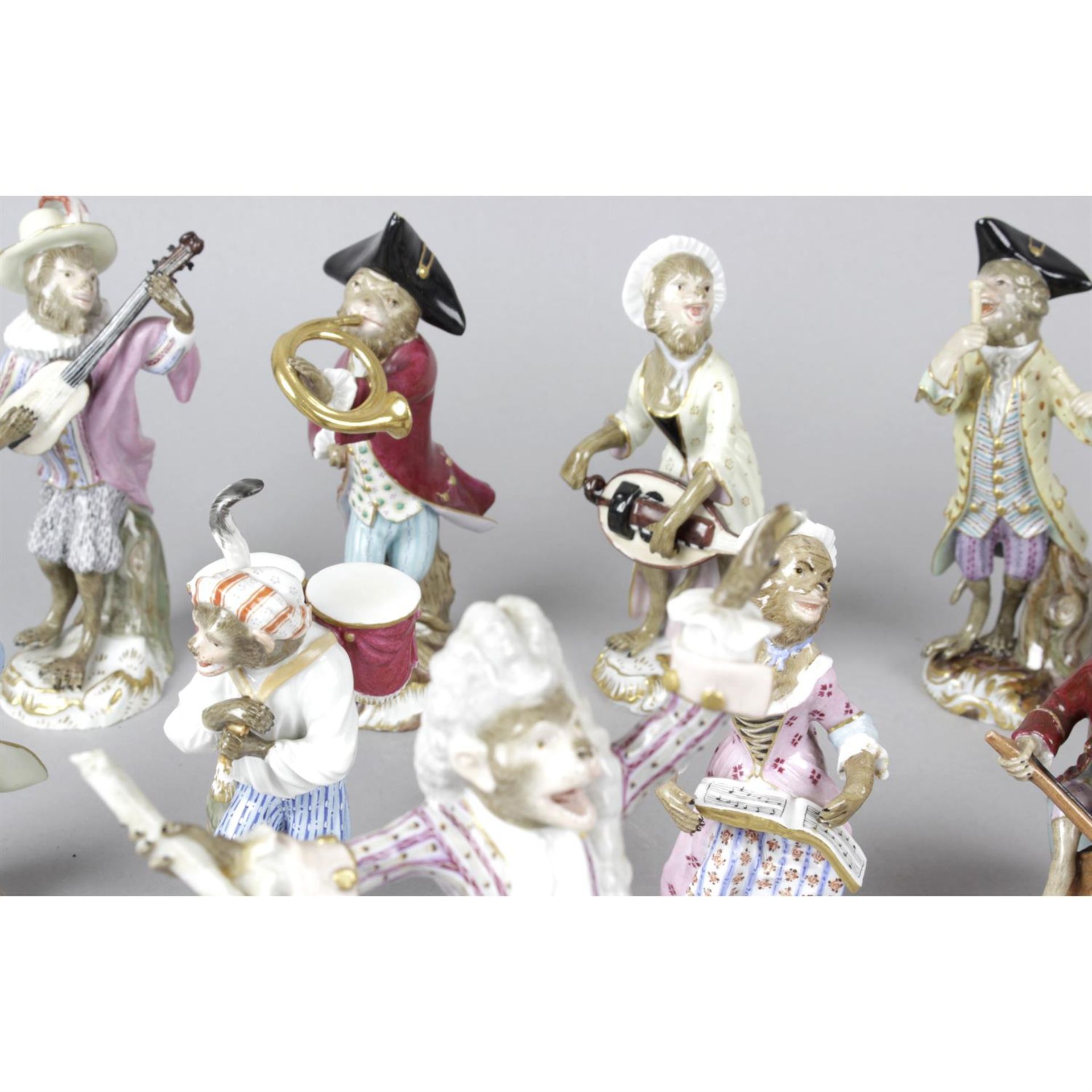 A group of ten porcelain monkey band figurines with Meissen style marks. - Image 2 of 5