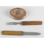 A 19th century snuff box and a wooden handled 'campaign style' knife and fork. (2).