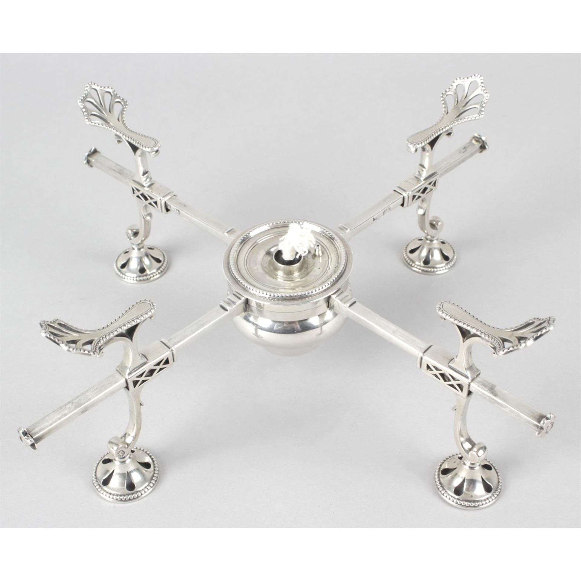 A George III silver dish cross by Hester Bateman.