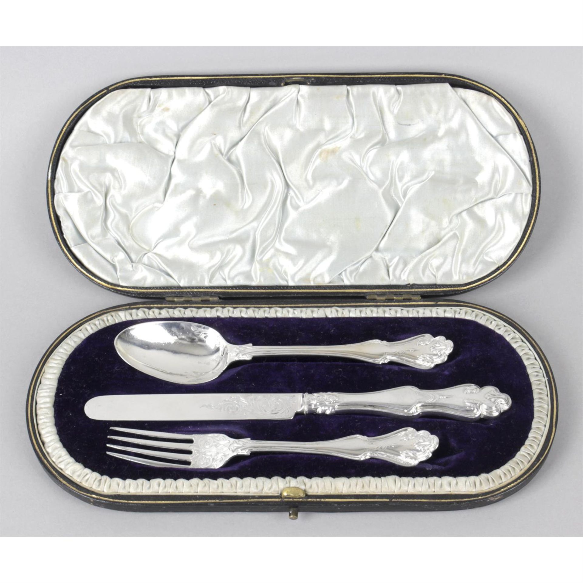 A cased Victorian silver christening set, comprising of a knife, fork and spoon.