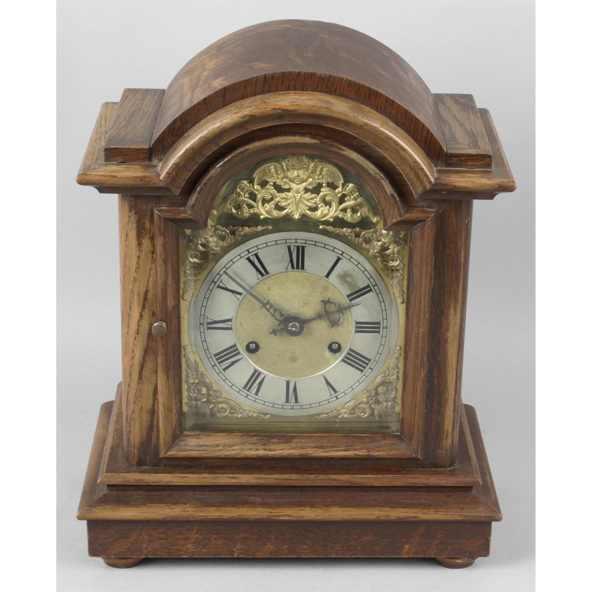 An early 20th century bracket style mantel clock.