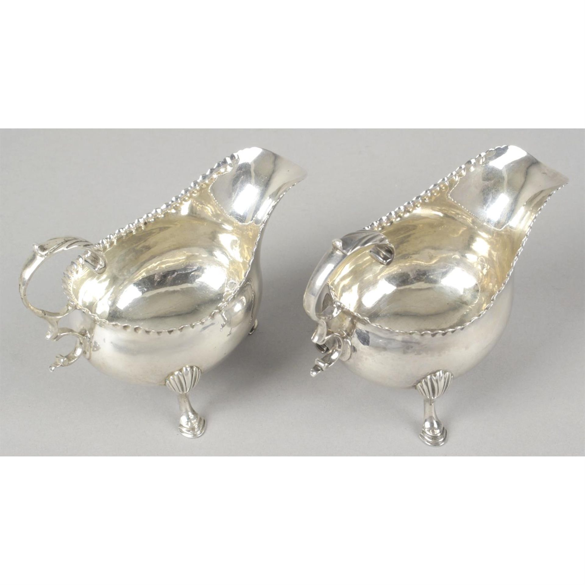 A pair of George III small silver sauce boats by Hester Bateman. - Image 2 of 3