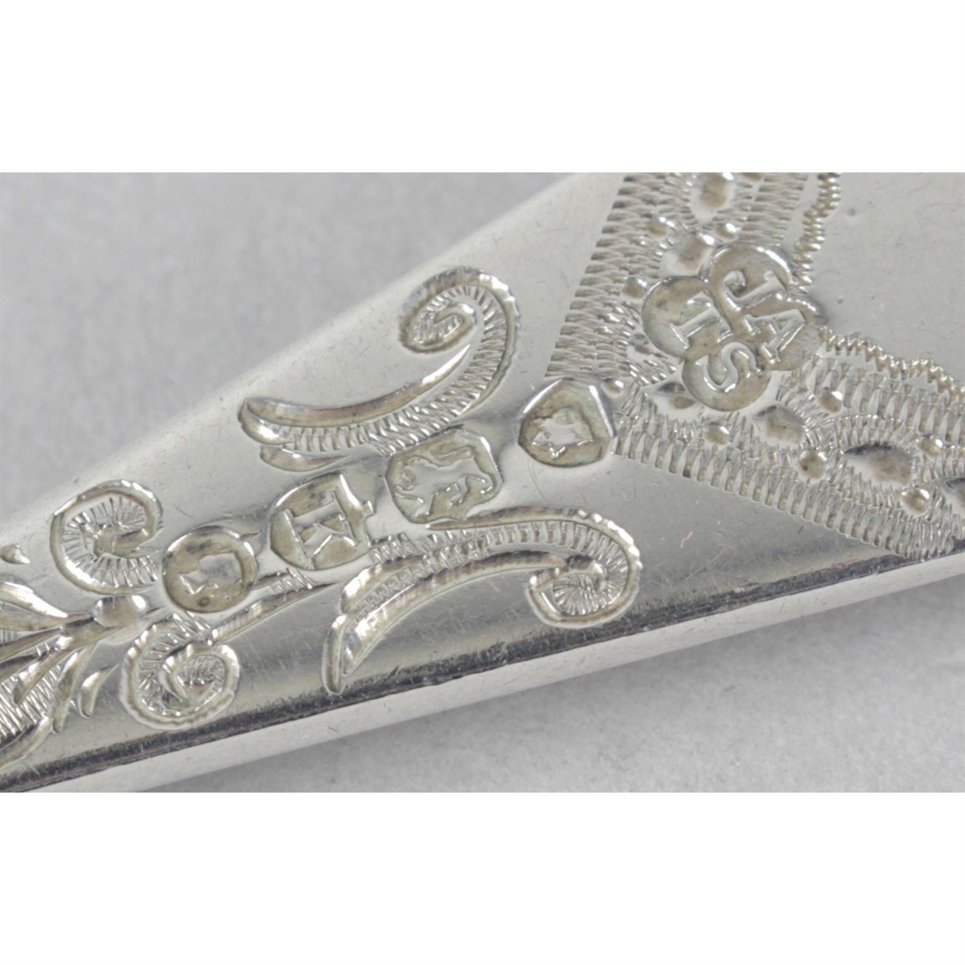 A cased late Victorian silver three piece christening set. - Image 2 of 3