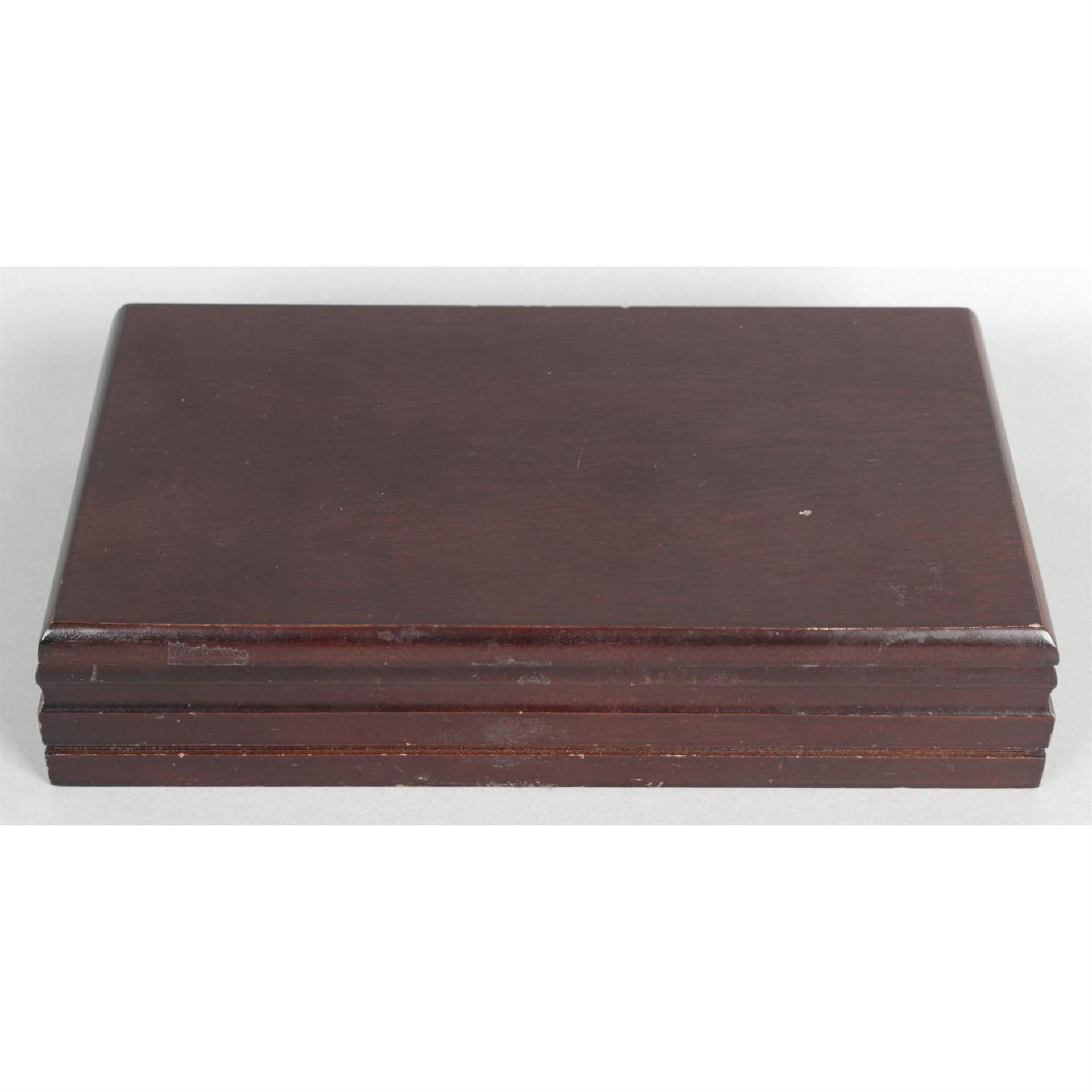 A modern stained mahogany jewellery box.