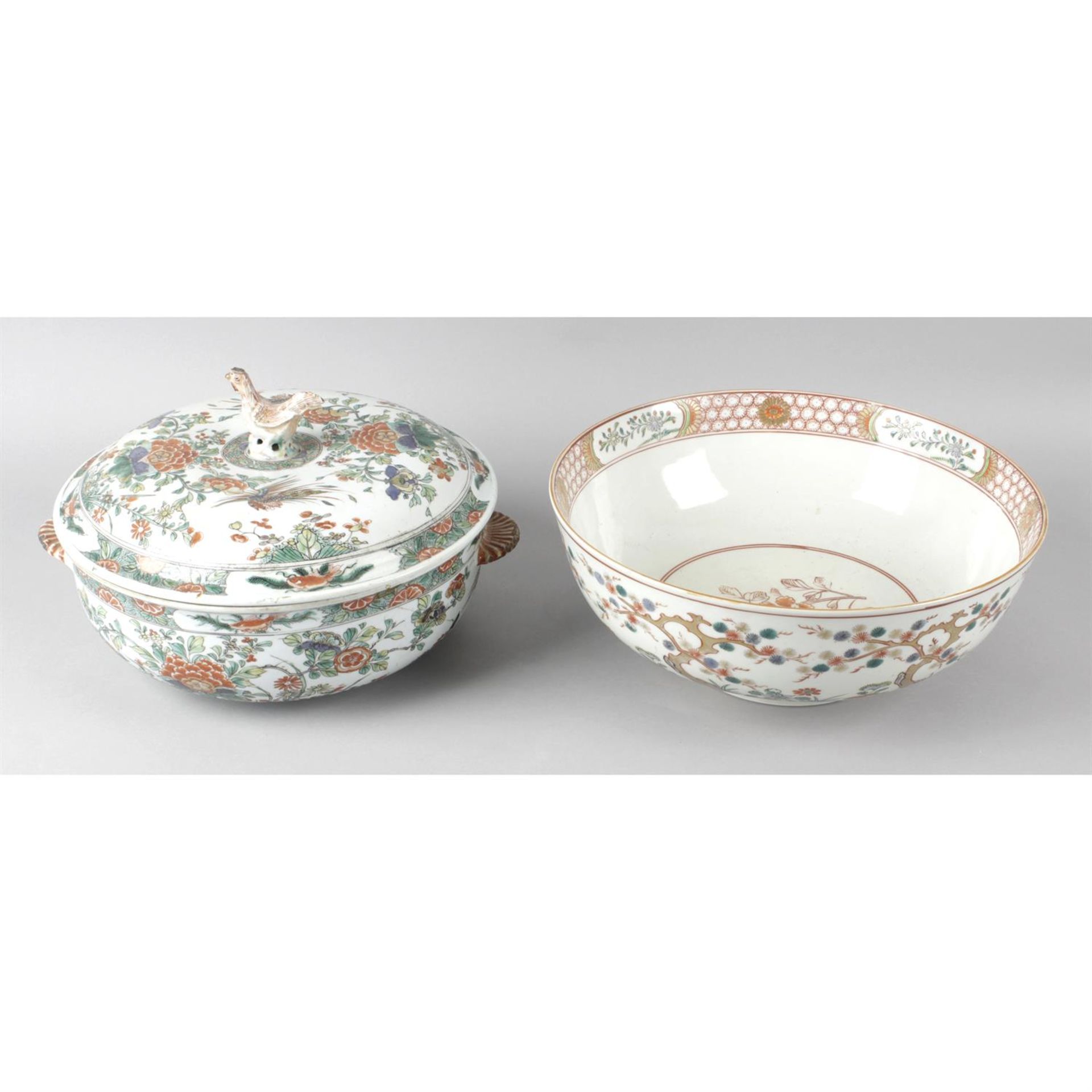 A twin handled oriental dish with cover together with an Imari bowl.