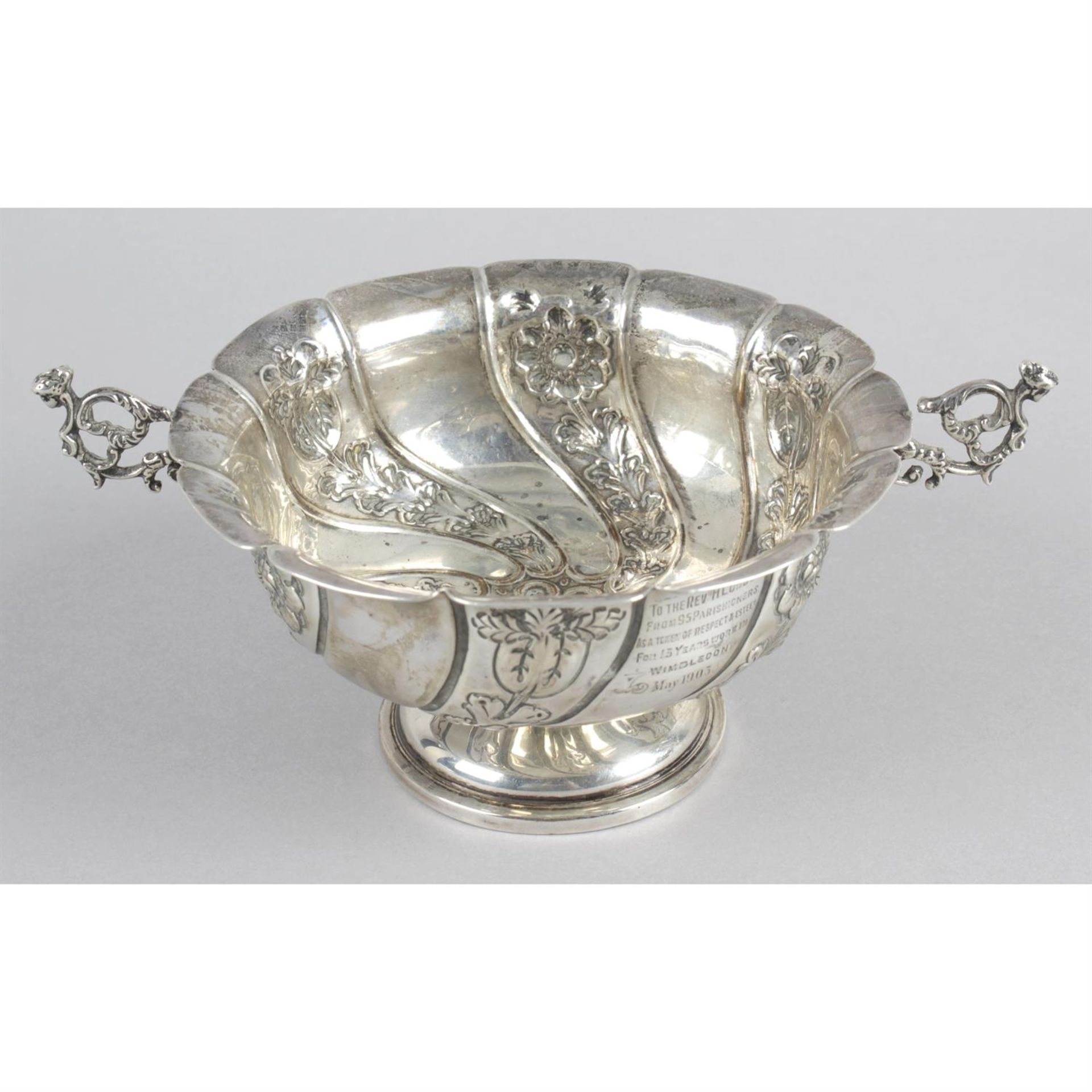 An Edwardian silver twin-handled pedestal bowl.