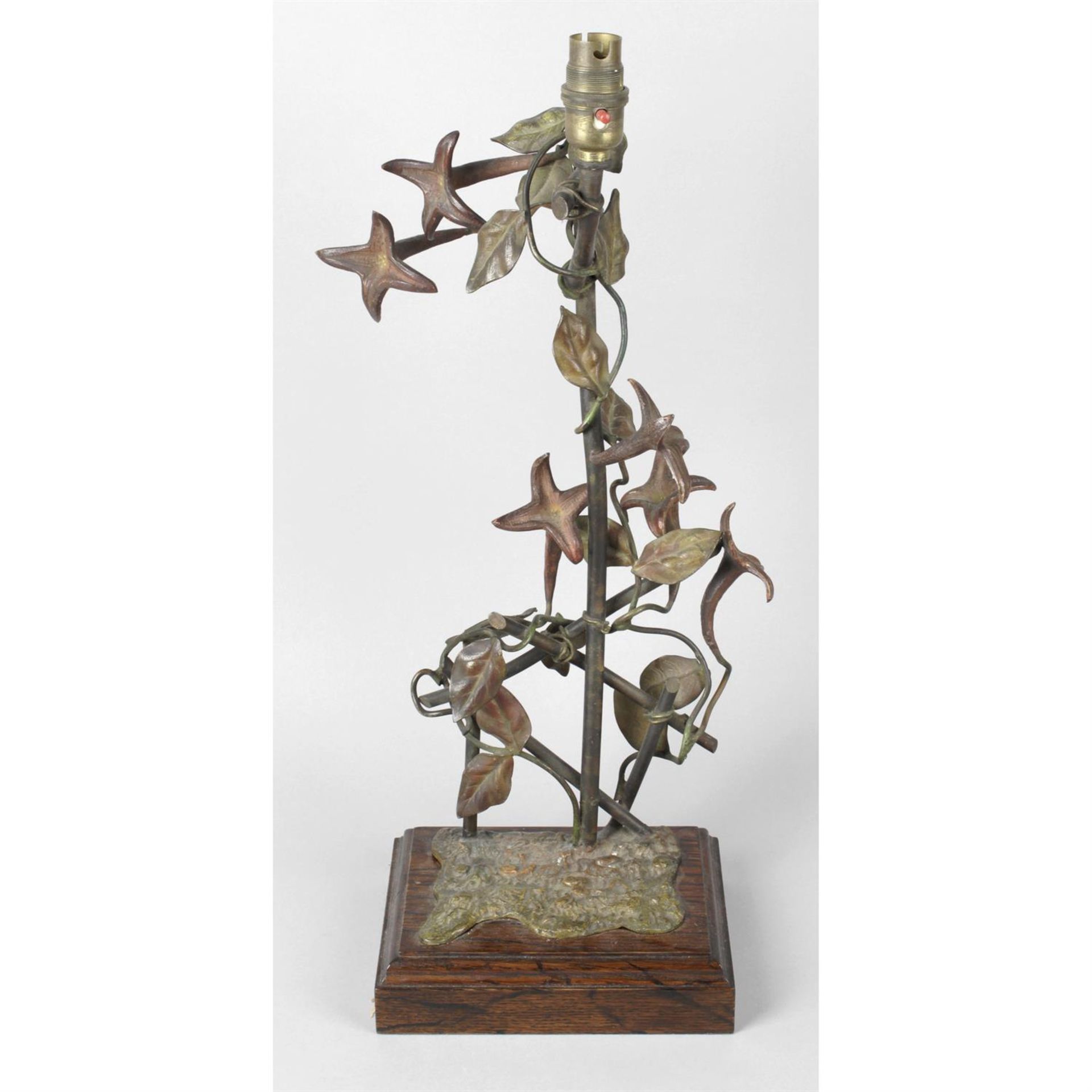 An Austrian cold painted bronze table lamp modelled as climbing flowers.