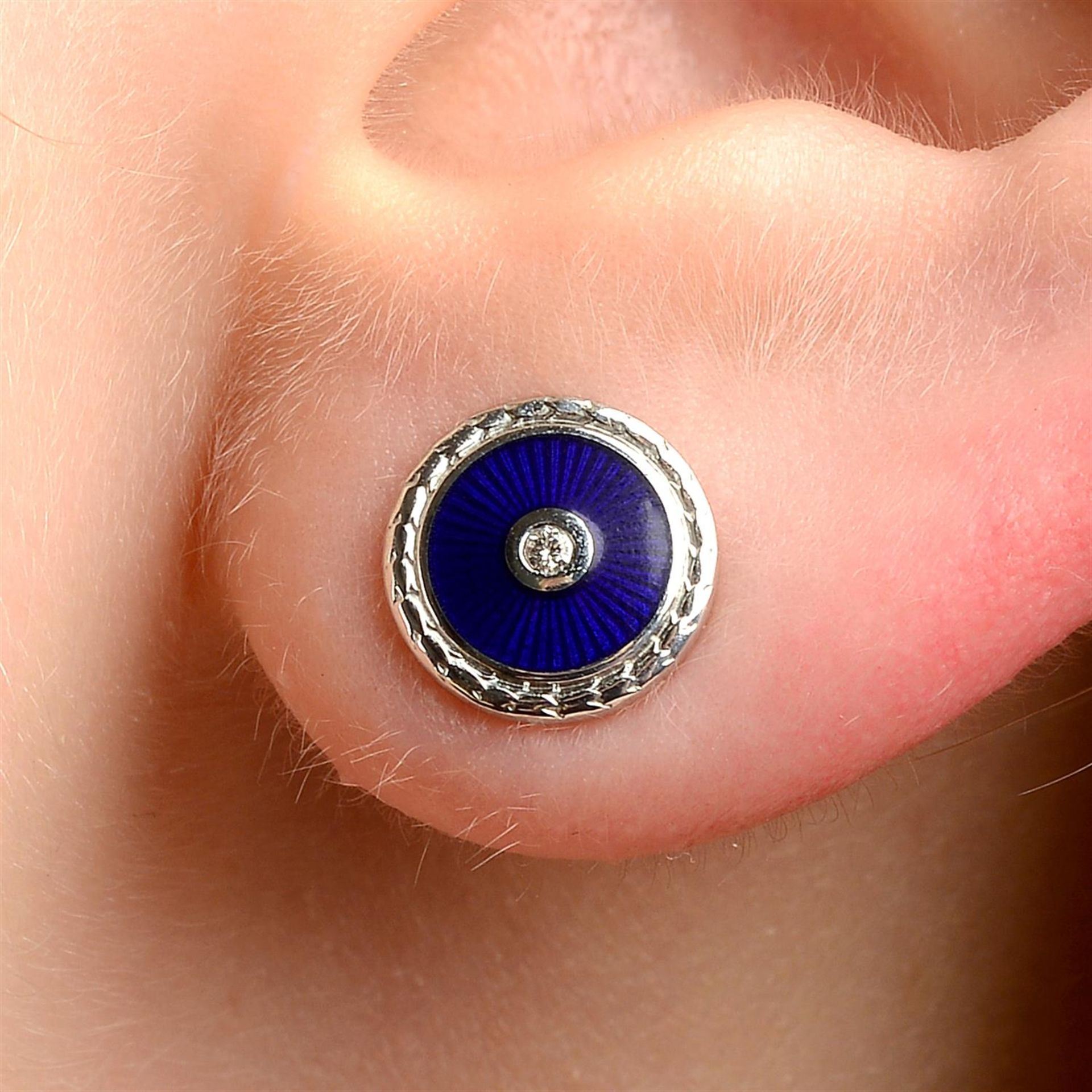 A pair of diamond and blue enamel earrings, by Fabergé.