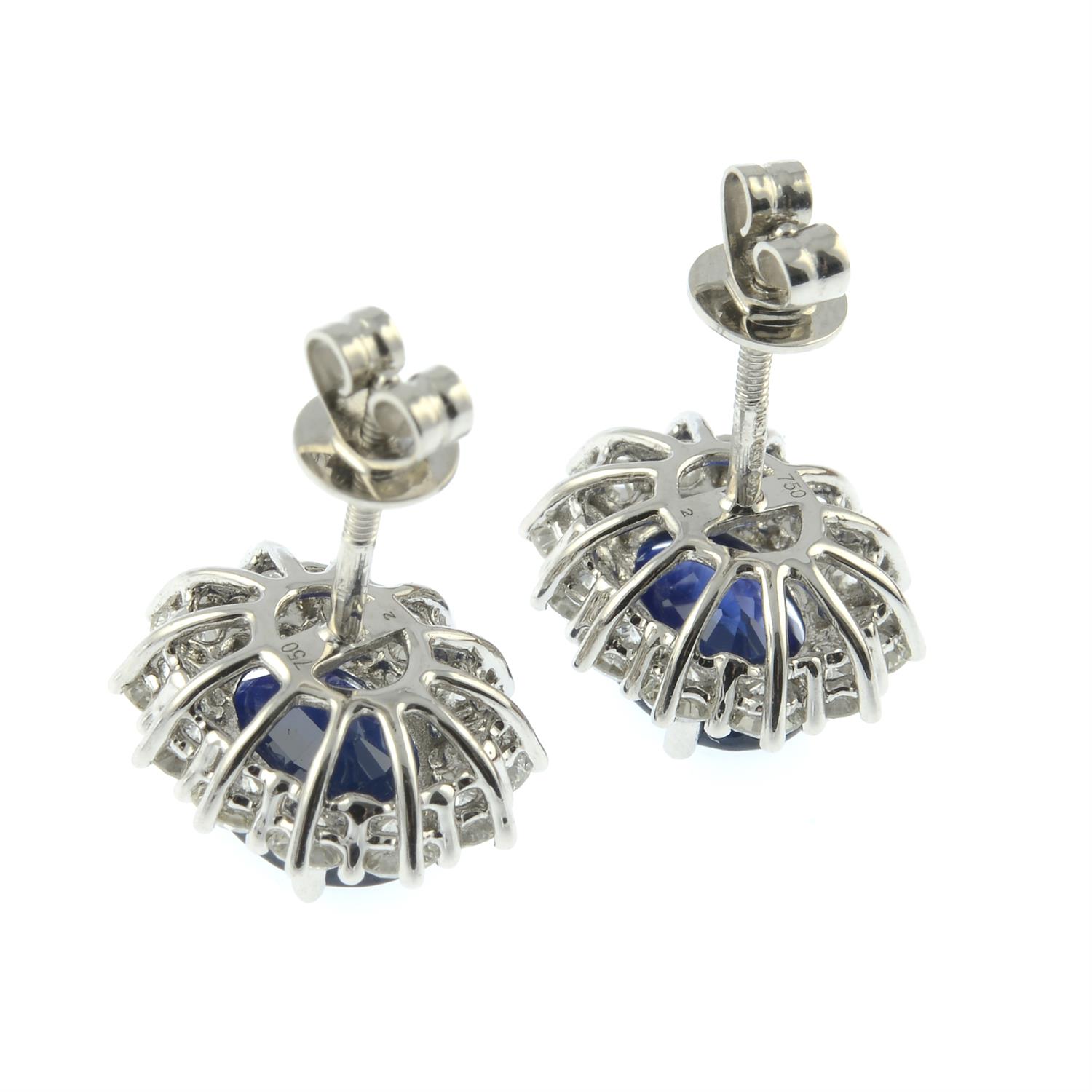 A pair of 18ct gold sapphire and brilliant-cut diamond cluster earrings. - Image 3 of 3