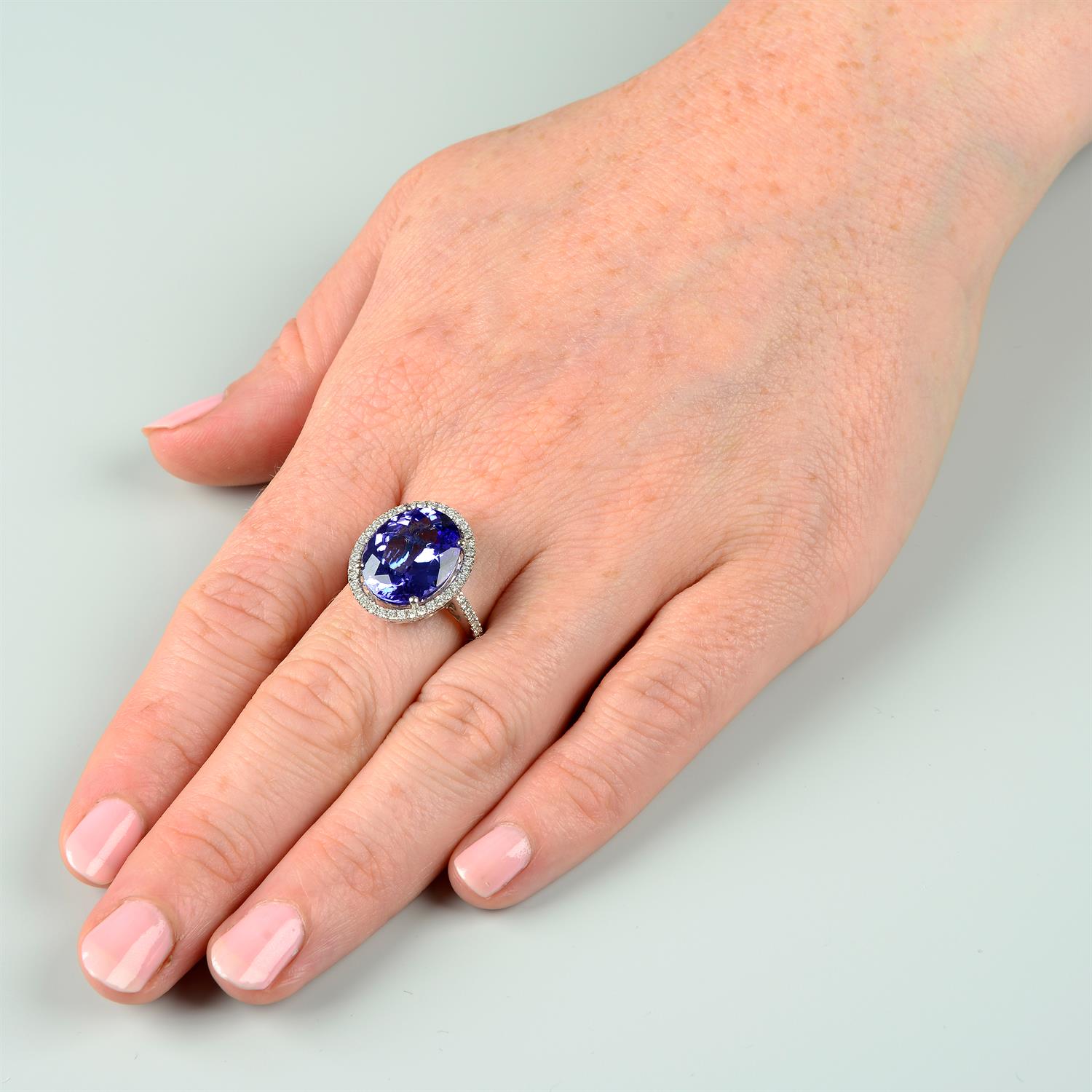 An 18ct gold tanzanite and brilliant-cut diamond ring. - Image 6 of 6