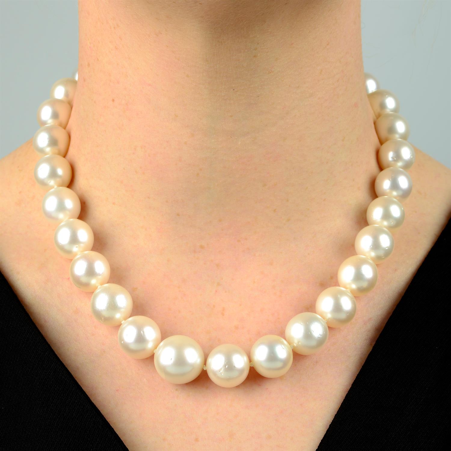 A slightly graduated cultured pearl single-strand necklace, with cultured pearl and circular-cut