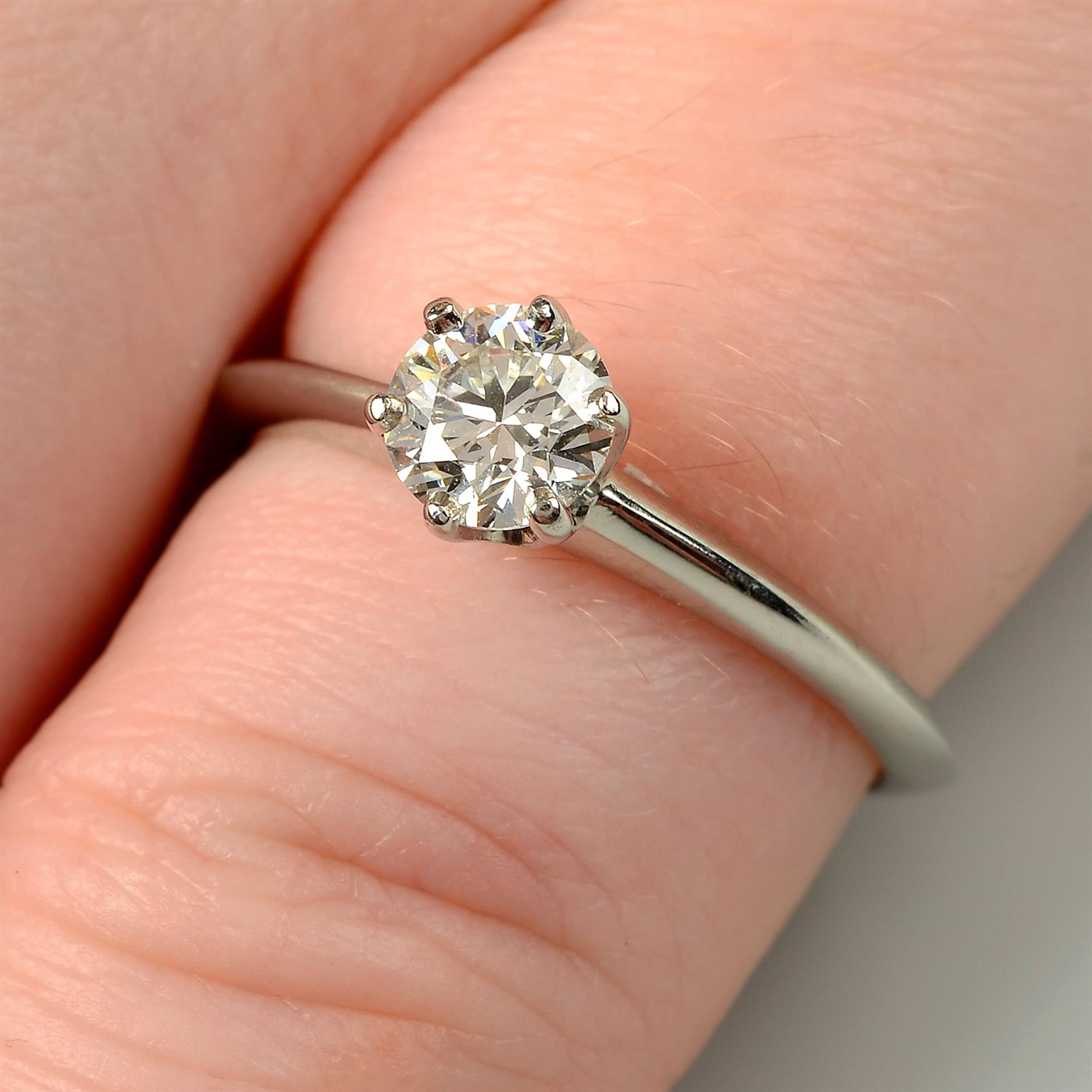 A diamond single-stone ring, by Tiffany & Co.