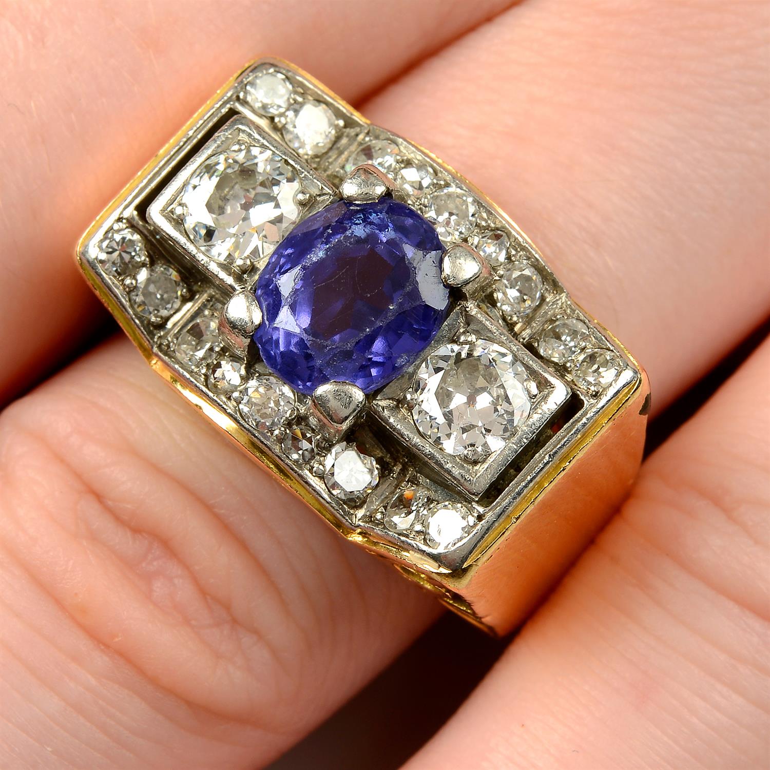 A 1940s palladium and gold sapphire and diamond dress ring.