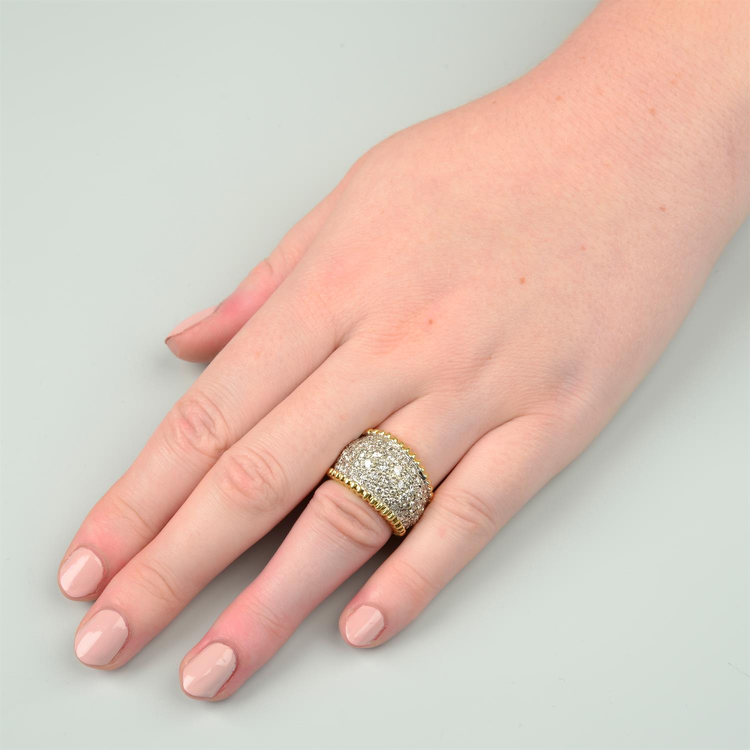 An 18ct gold pavé-set diamond tapered ring. - Image 6 of 6