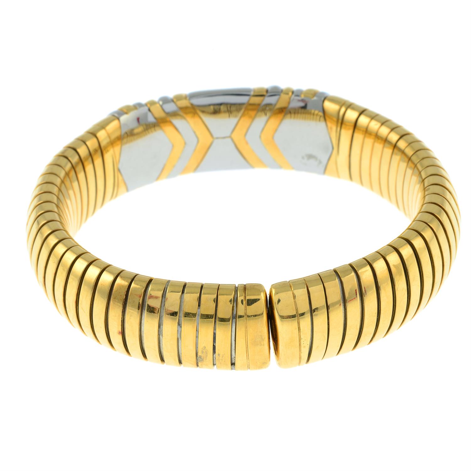 A bi-colour bangle, by Bulgari. - Image 3 of 4