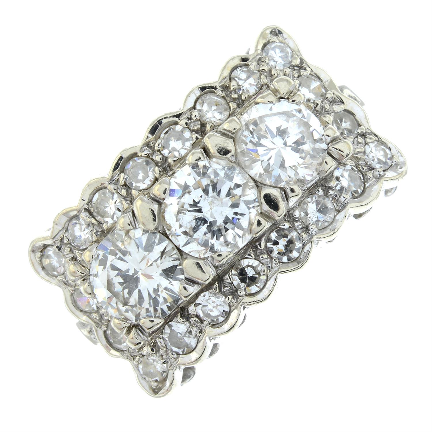 A brilliant-cut diamond three-stone ring, with single-cut diamond shared surround. - Image 2 of 6