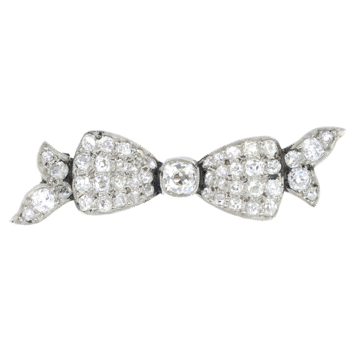 An early 20th century platinum and gold, old-cut diamond bow brooch. - Image 2 of 4