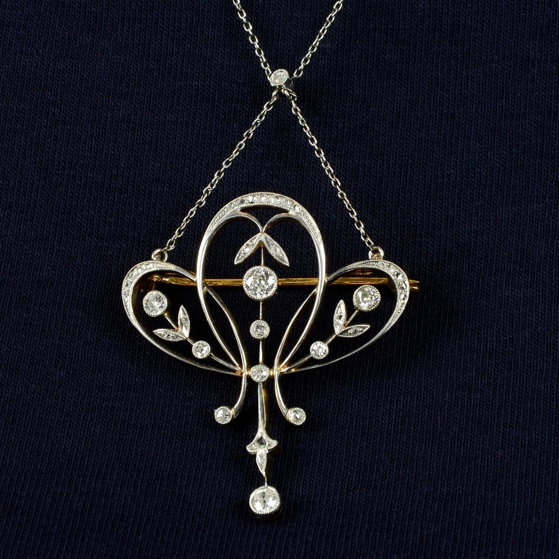 A Belle Époque platinum and gold old and rose-cut diamond pendant, with later rose-cut diamond