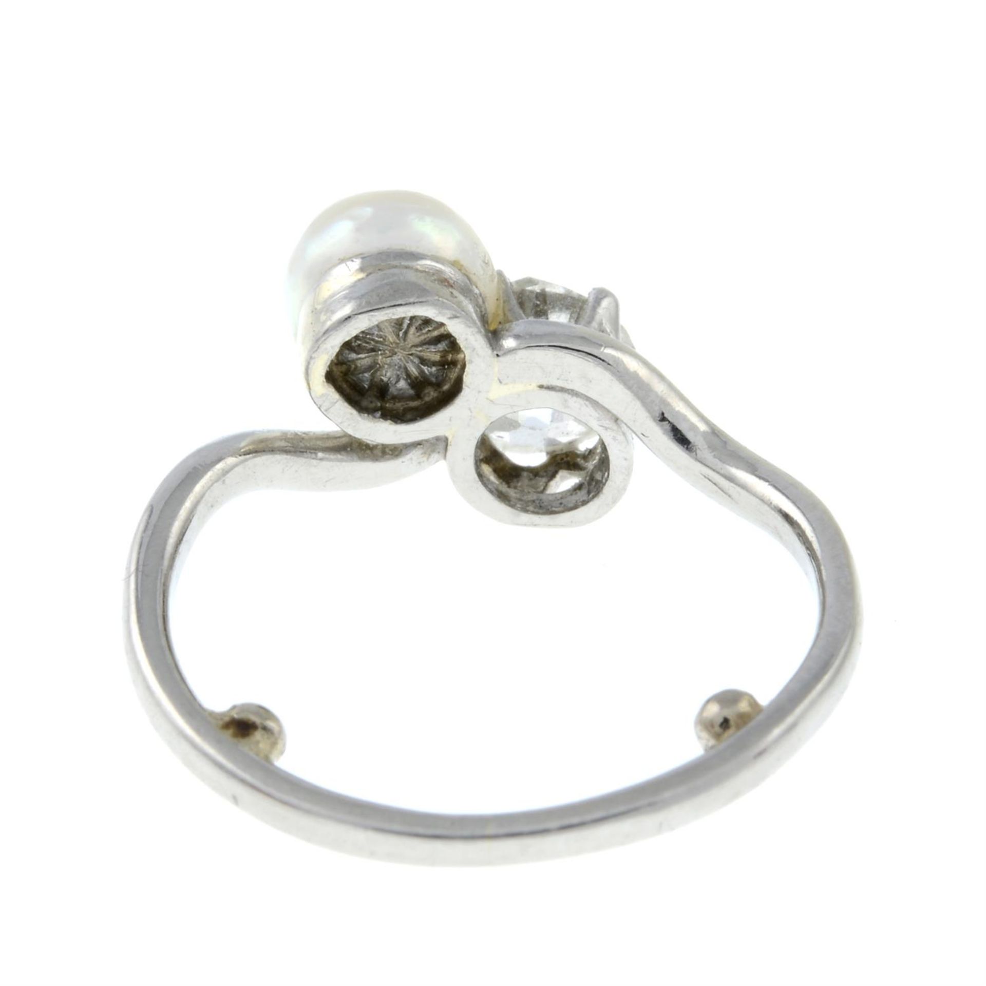 A mid 20th century platinum, old-cut diamond and cultured pearl crossover ring. - Image 5 of 6