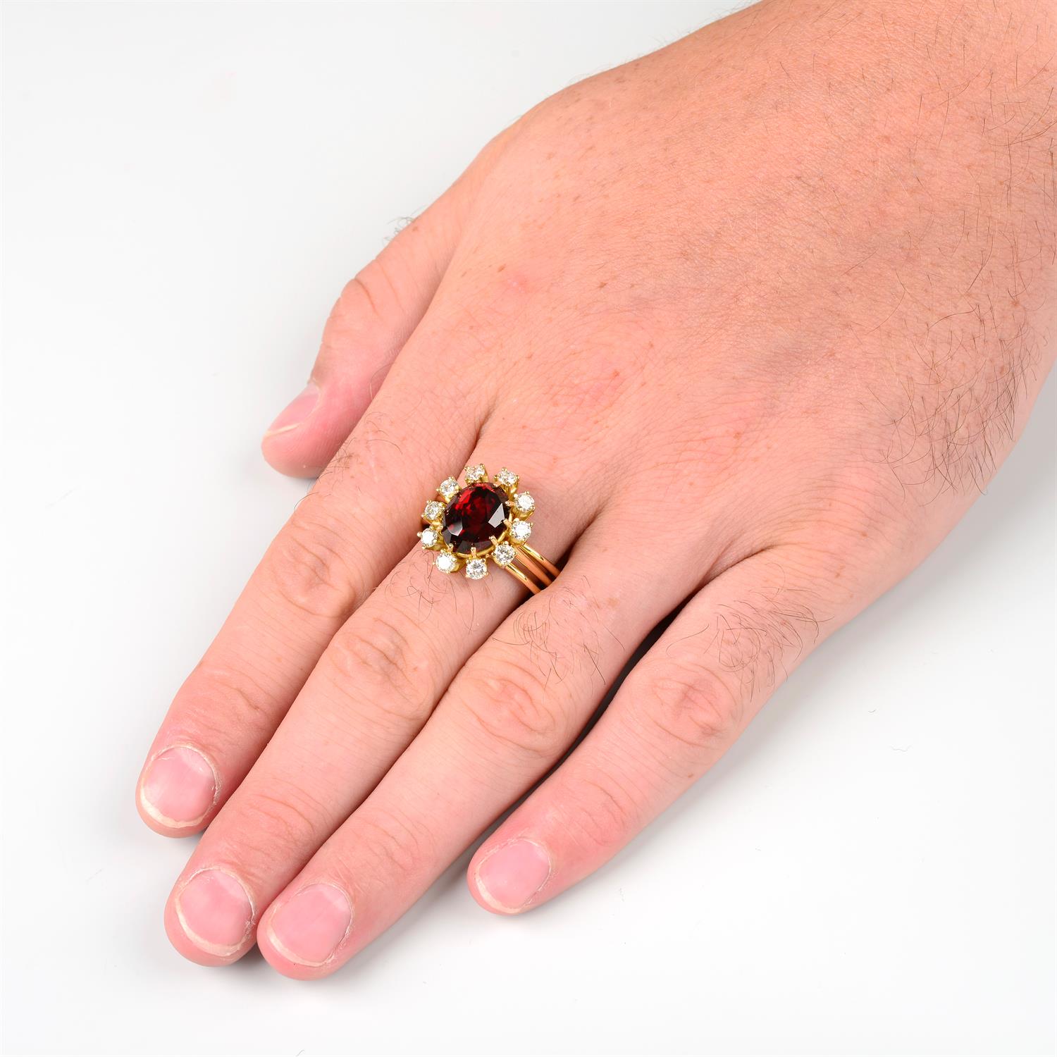 A garnet and brilliant-cut diamond cluster ring, attributed to Erwin Springbrunn. - Image 6 of 6