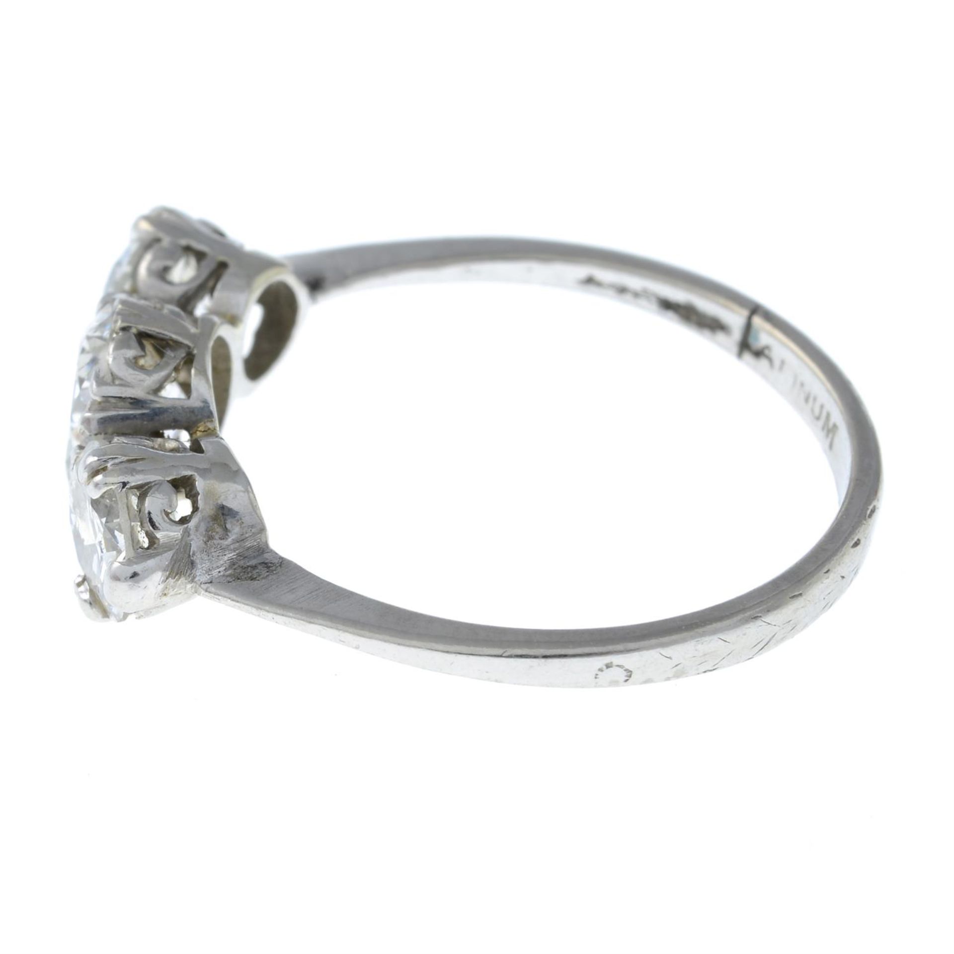 A mid 20th century platinum, graduated diamond three stone ring. - Image 3 of 6