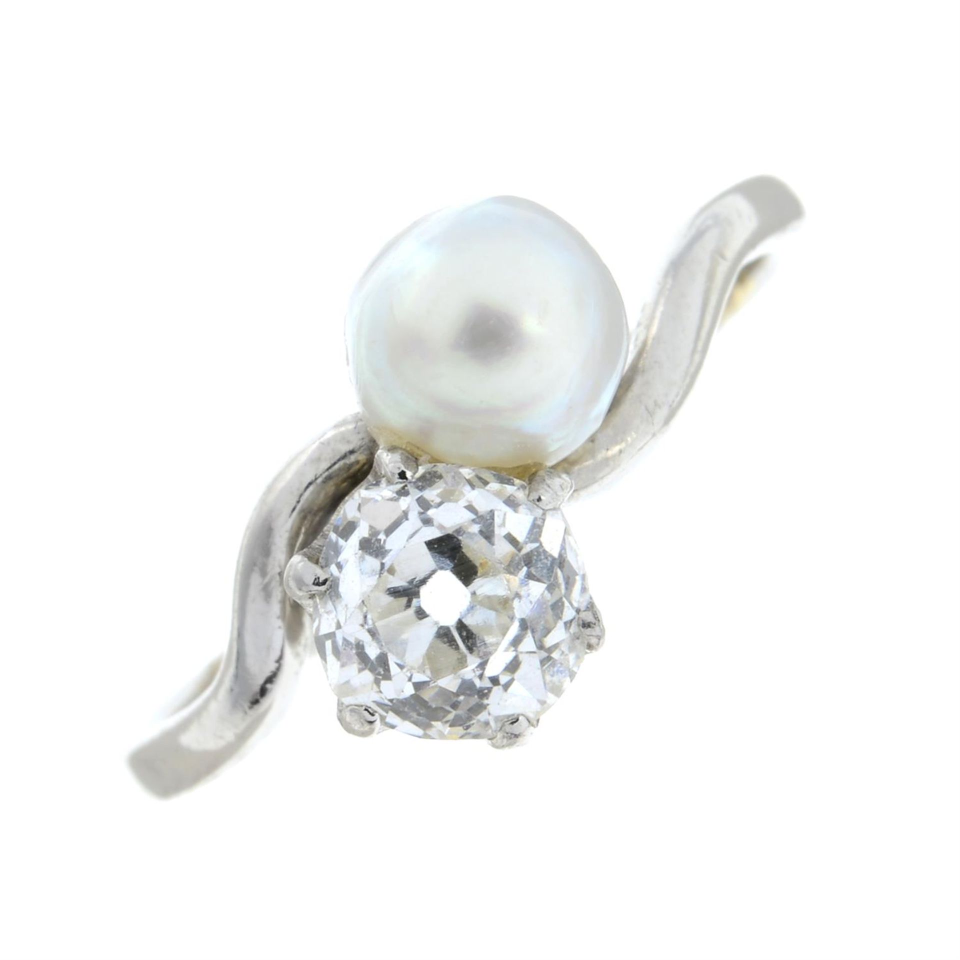 A mid 20th century platinum, old-cut diamond and cultured pearl crossover ring. - Image 2 of 6