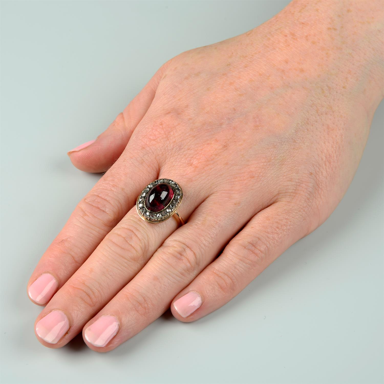 A garnet and rose-cut diamond cluster ring. - Image 6 of 6