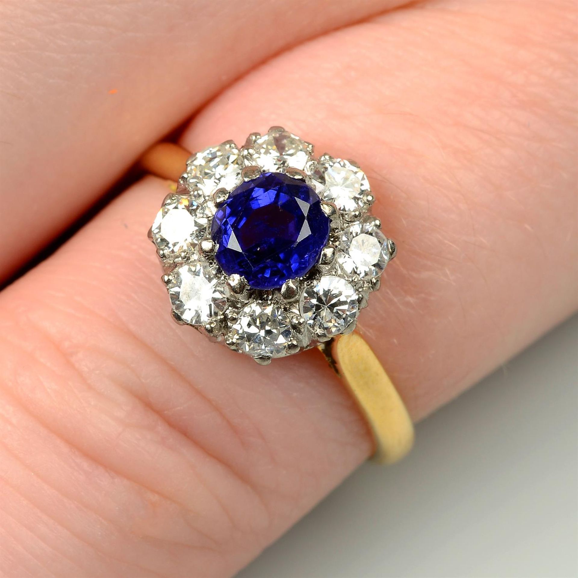 A late Victorian 18ct gold Sri Lankan colour-change sapphire and diamond cluster ring.