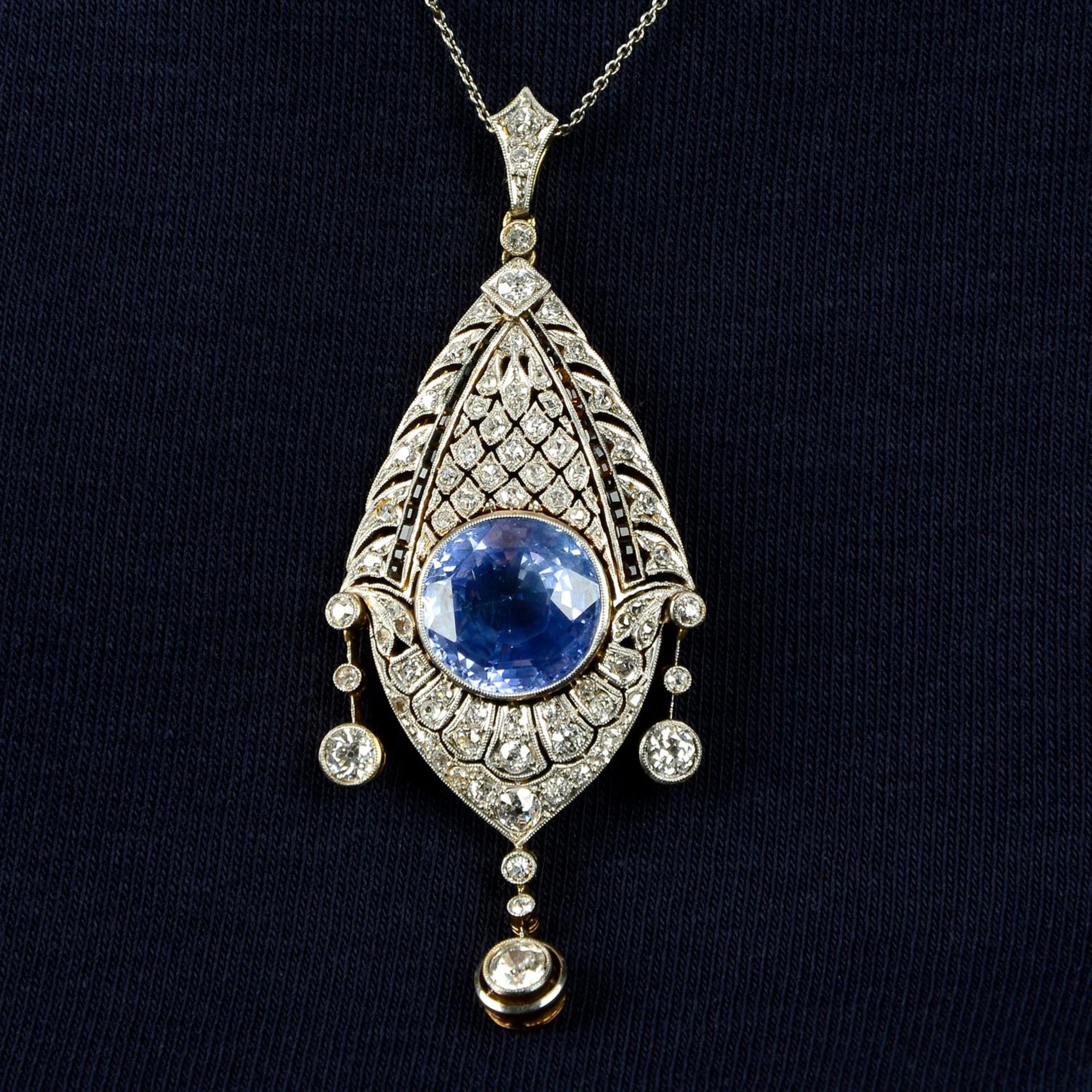 A Belle Époque platinum and 15ct gold, Sri Lankan sapphire, diamond and onyx pierced pendant,