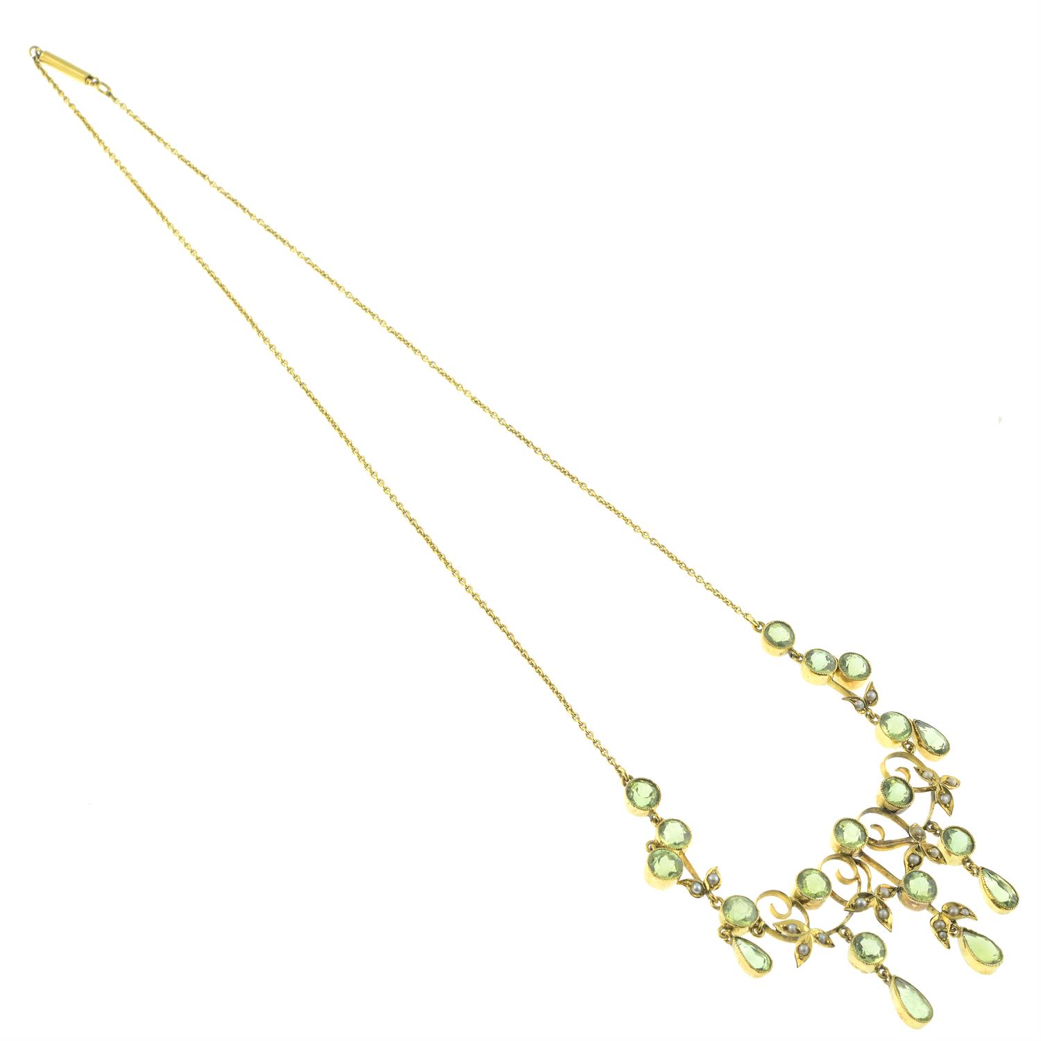 An early 20th century 9ct gold peridot and split pearl fringe necklace. - Image 4 of 5