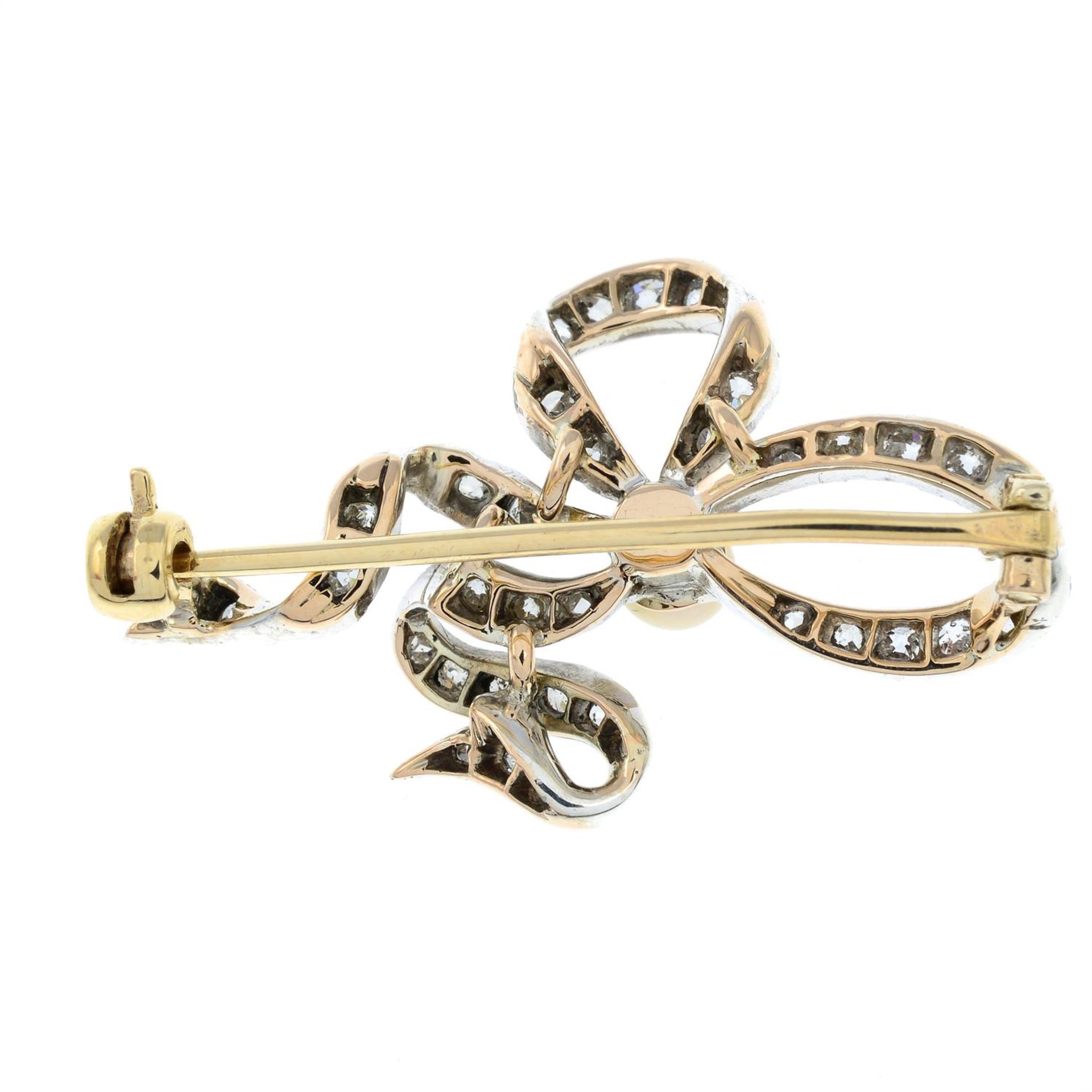 A late 19th century silver and gold, old-cut diamond and pearl ribbon brooch. - Image 3 of 5