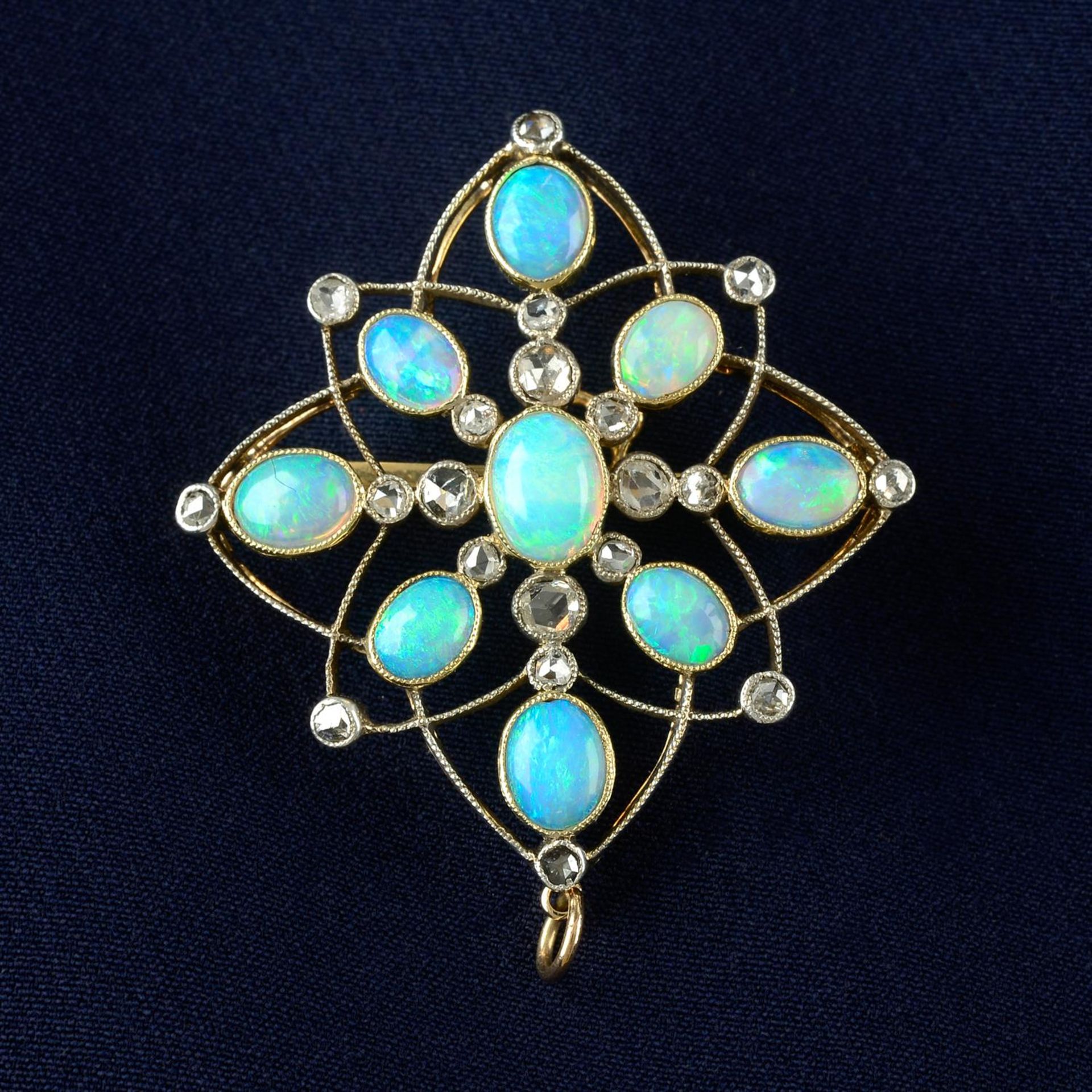 An early 20th century silver and gold, opal and rose-cut diamond brooch.