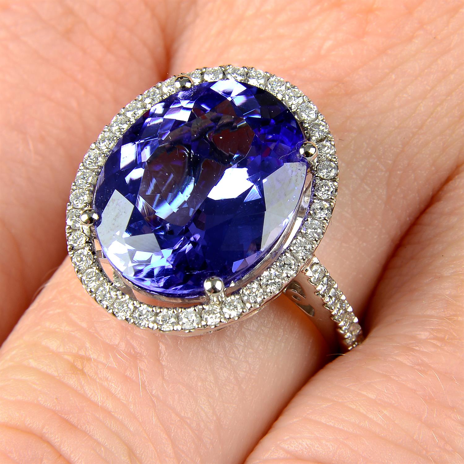 An 18ct gold tanzanite and brilliant-cut diamond ring.