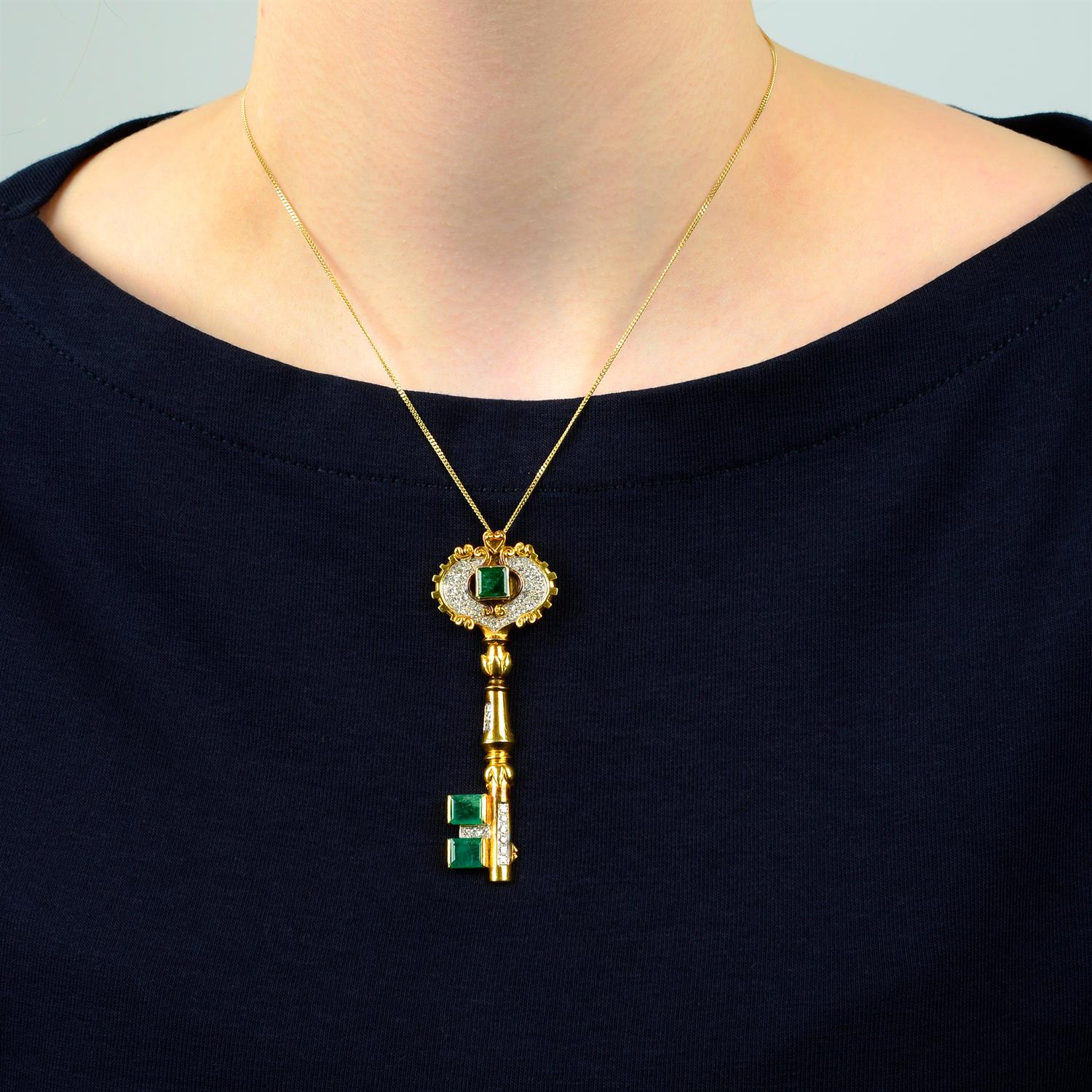 A mid 20th century gold emerald and single-cut diamond key pendant. - Image 4 of 4