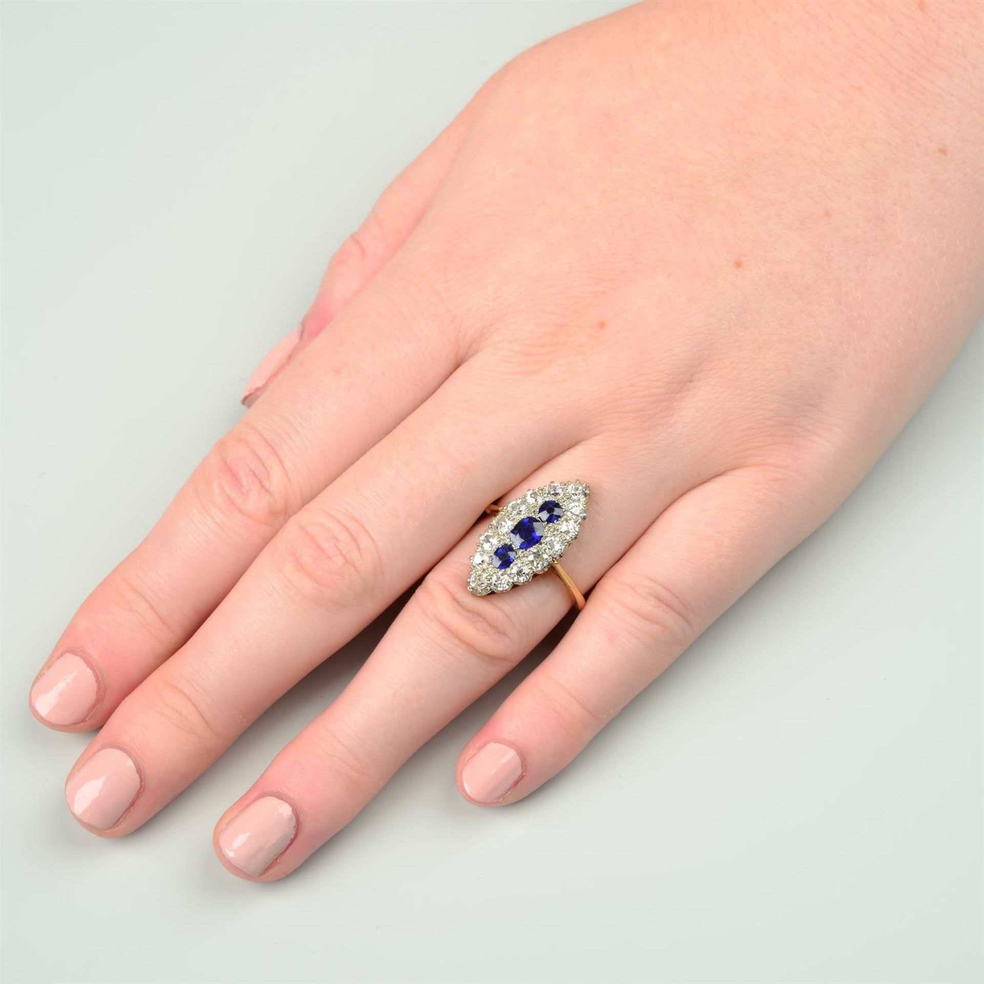 An early 20th century platinum and 18ct gold, sapphire and old-cut diamond navette-shape cluster - Image 6 of 6