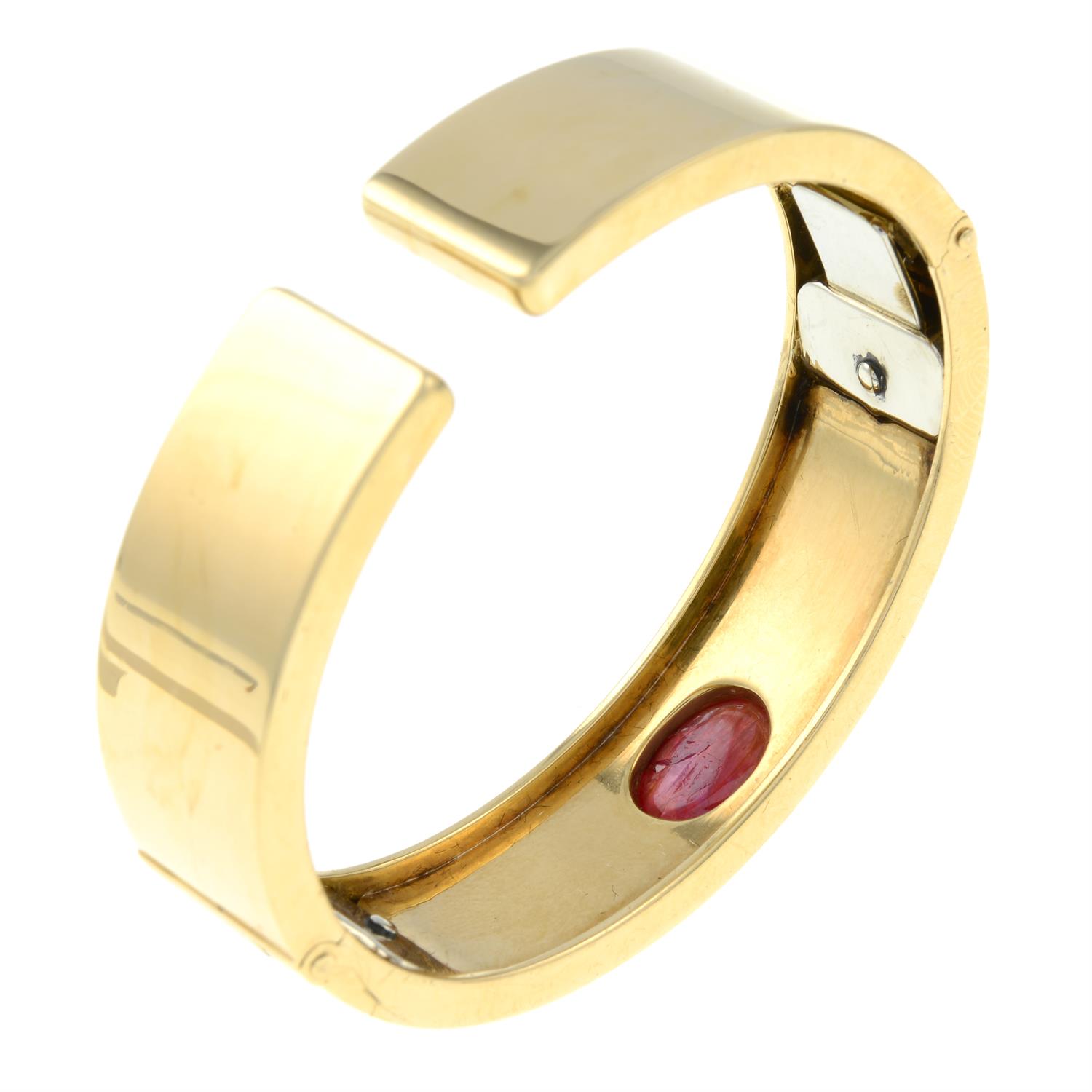 A ruby cabochon hinged bangle cuff, by Bulgari. - Image 5 of 5