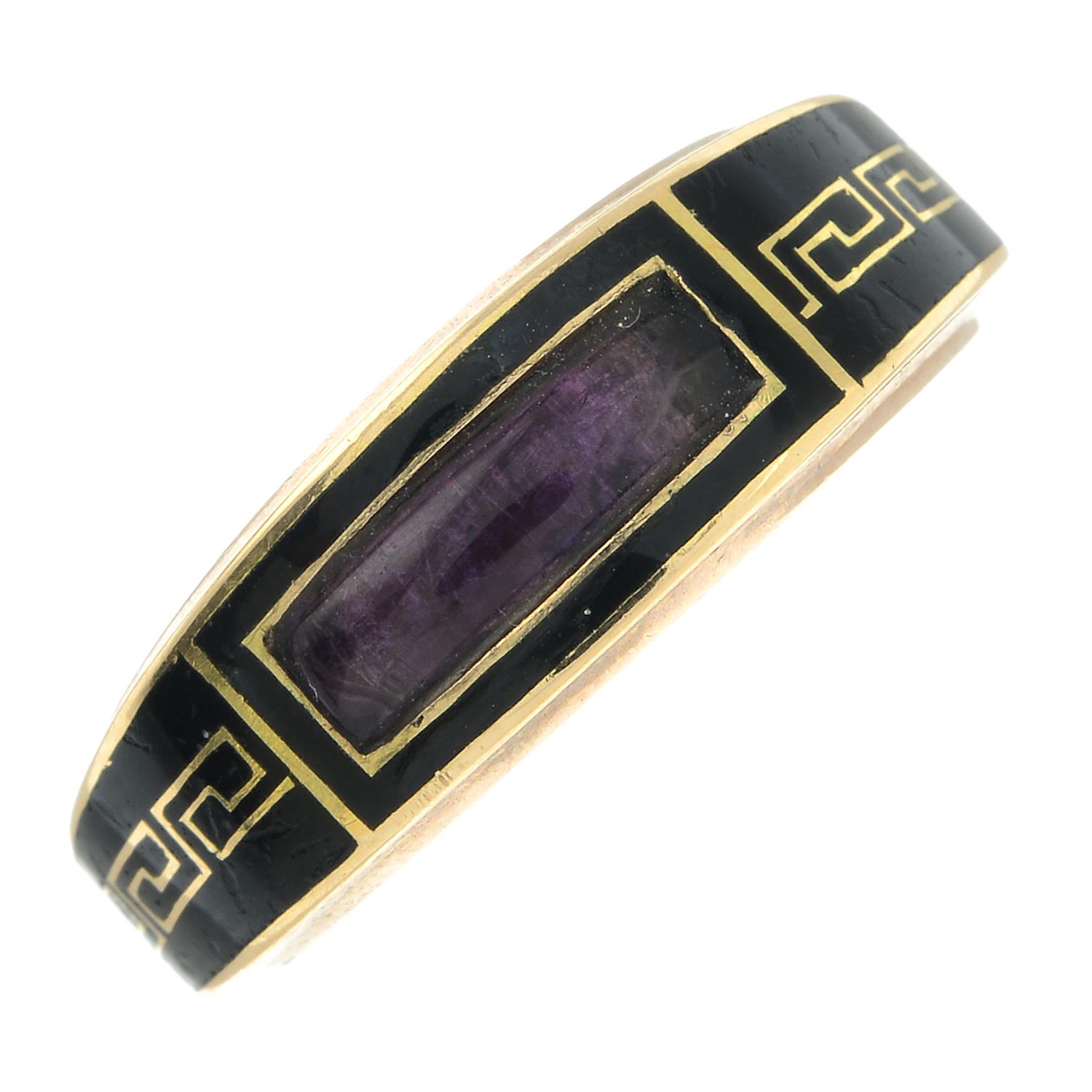 A late Georgian 9ct gold, Greek-key black enamel and foil back amethyst tapered mourning ring. - Image 2 of 6