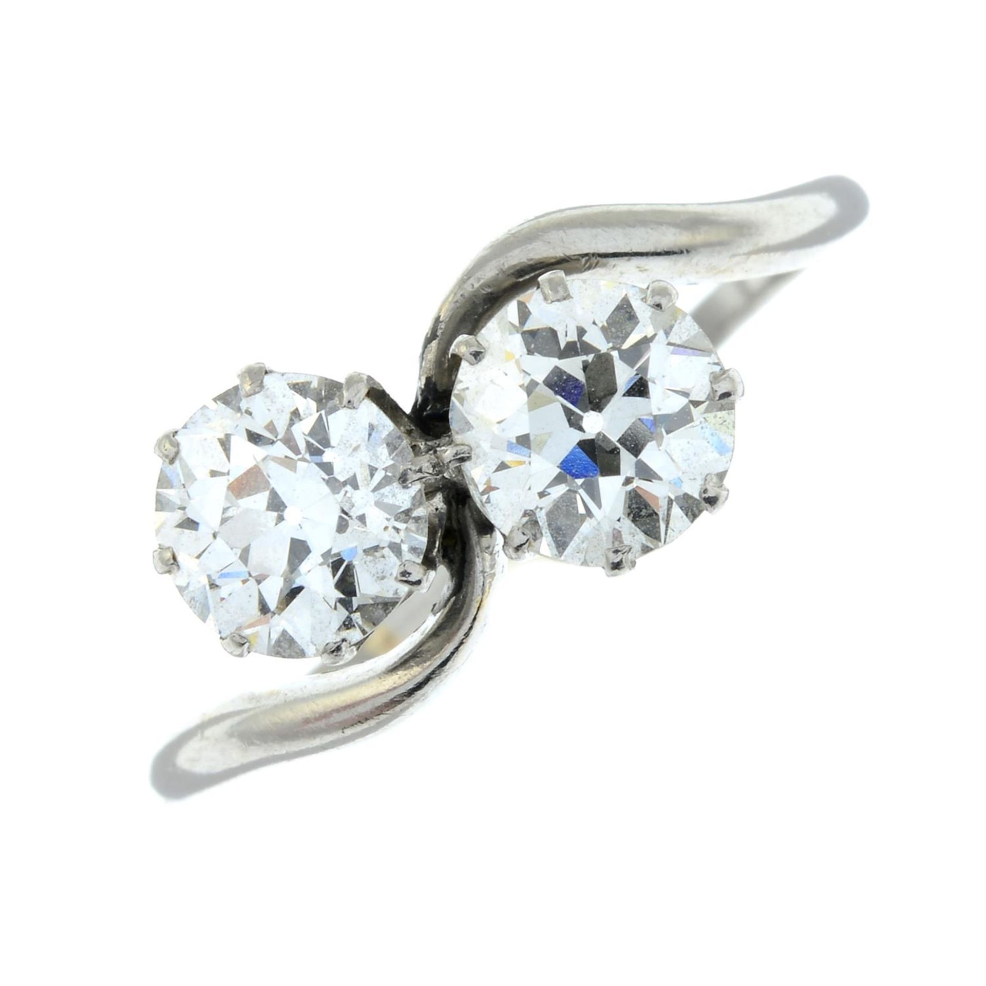 A mid 20th century platinum old-cut diamond two-stone crossover ring. - Bild 2 aus 6