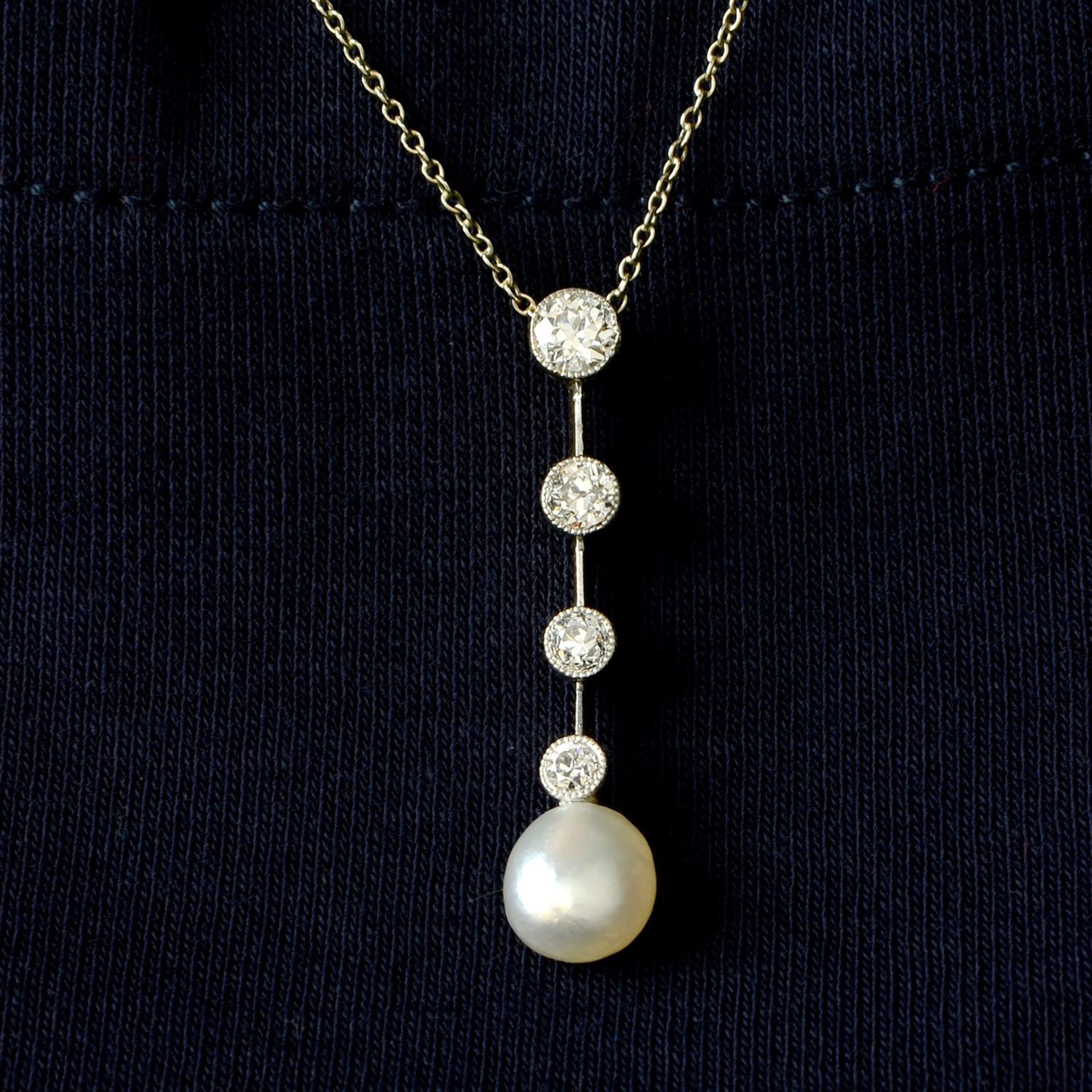 A pearl and graduated circular-cut diamond collet pendant, on chain.