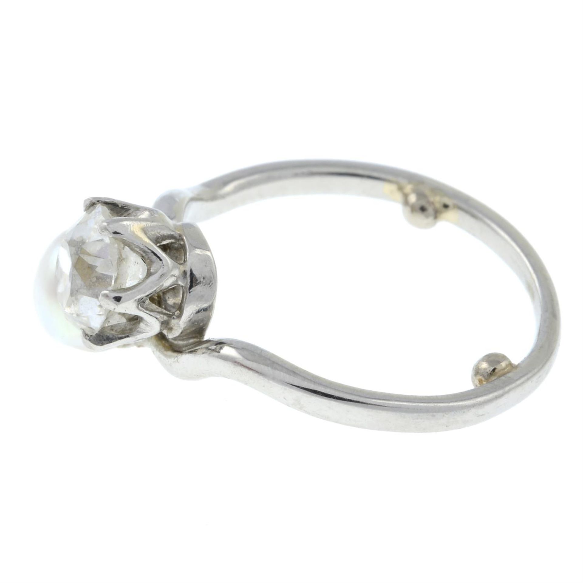 A mid 20th century platinum, old-cut diamond and cultured pearl crossover ring. - Image 3 of 6